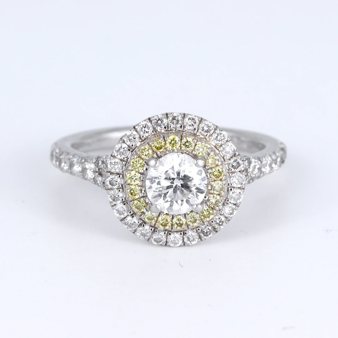 PLATINUM DIAMOND HALO RING.