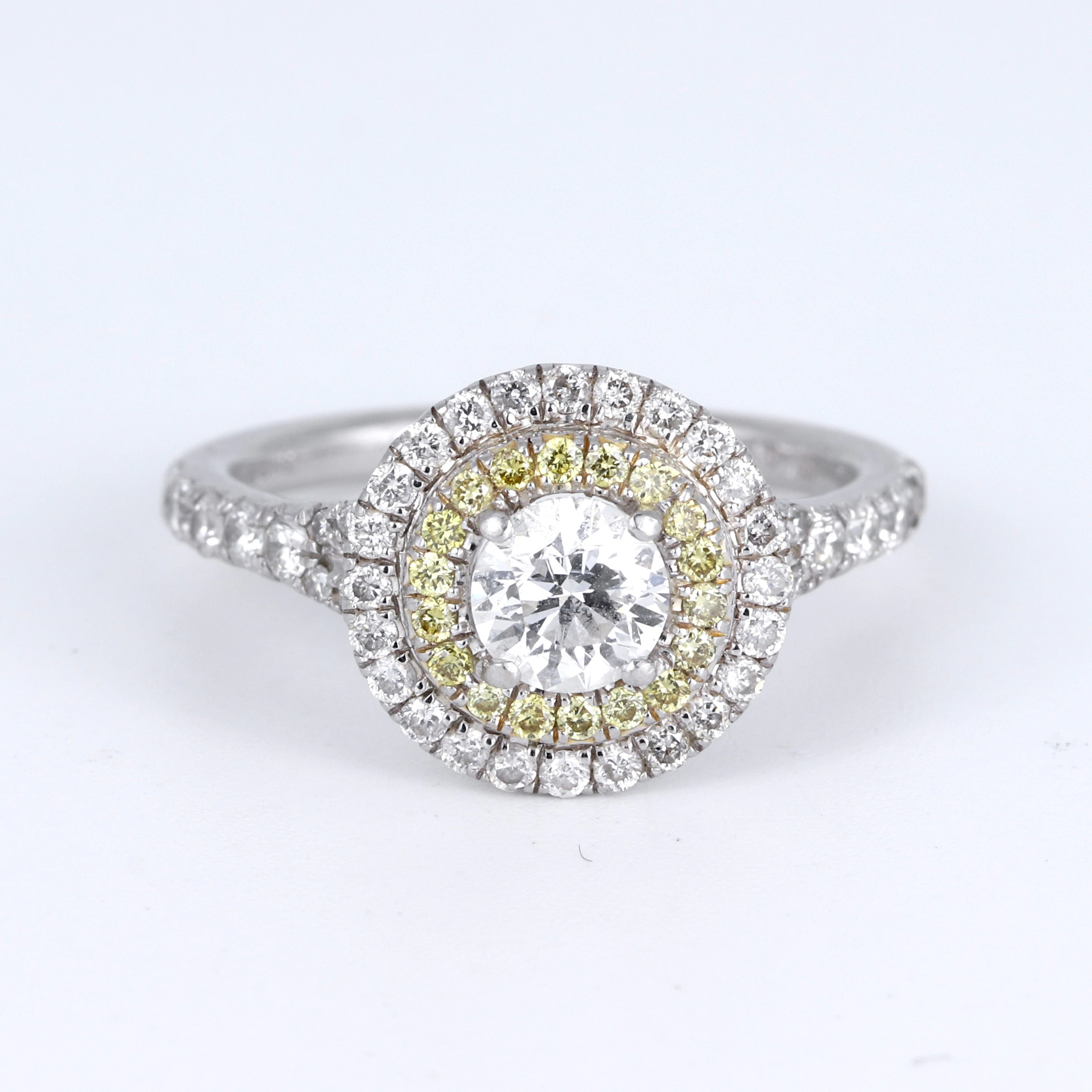 PLATINUM DIAMOND HALO RING.