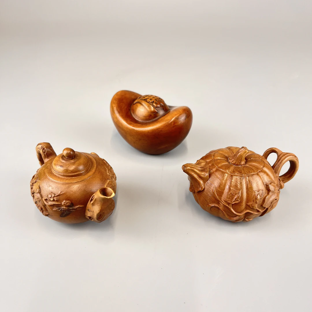 CHINESE FRUITWOOD CARVINGS.