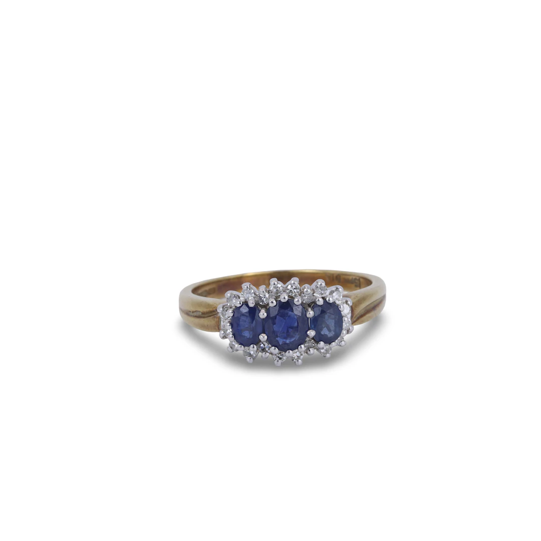 SAPPHIRE AND DIAMOND 9CT RING.