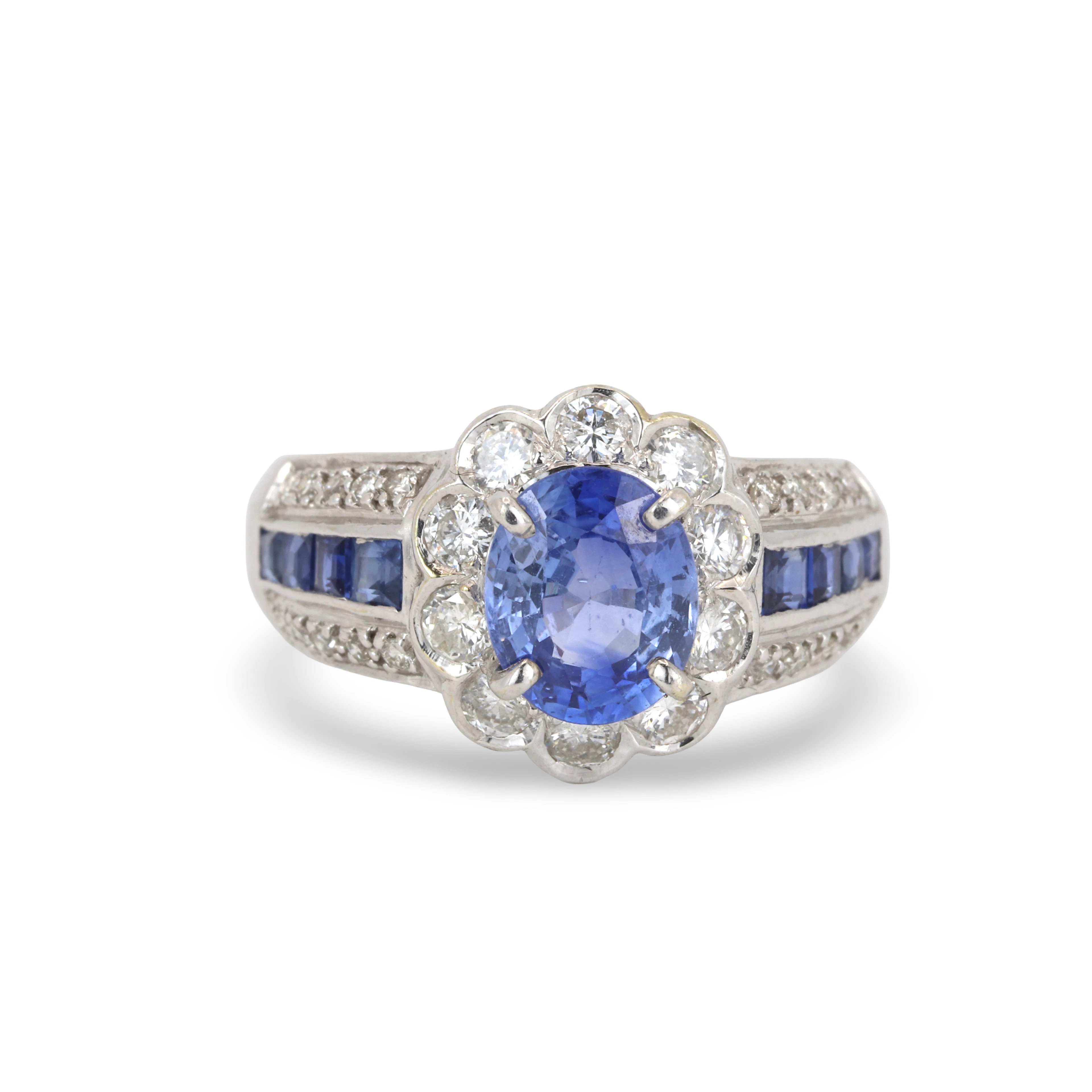 18CT GOLD SAPPHIRE & DIAMOND RING.