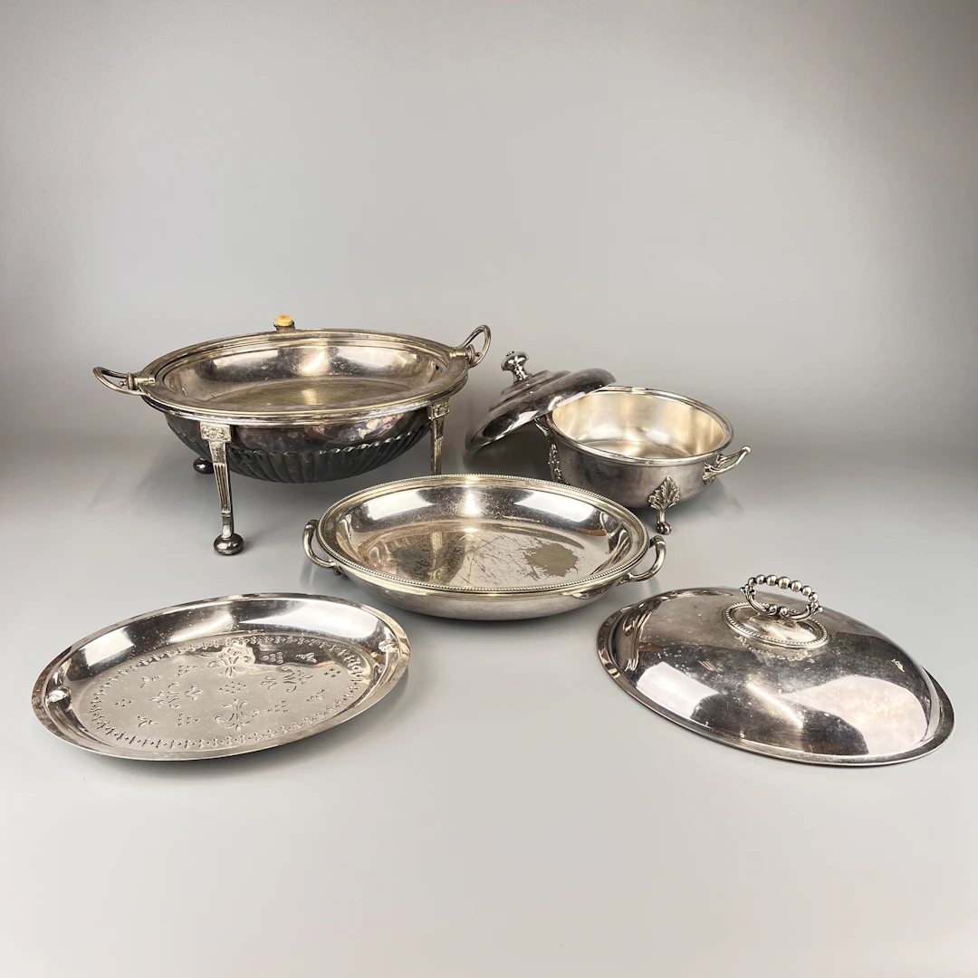 THREE SILVER PLATED SERVING DISHES.