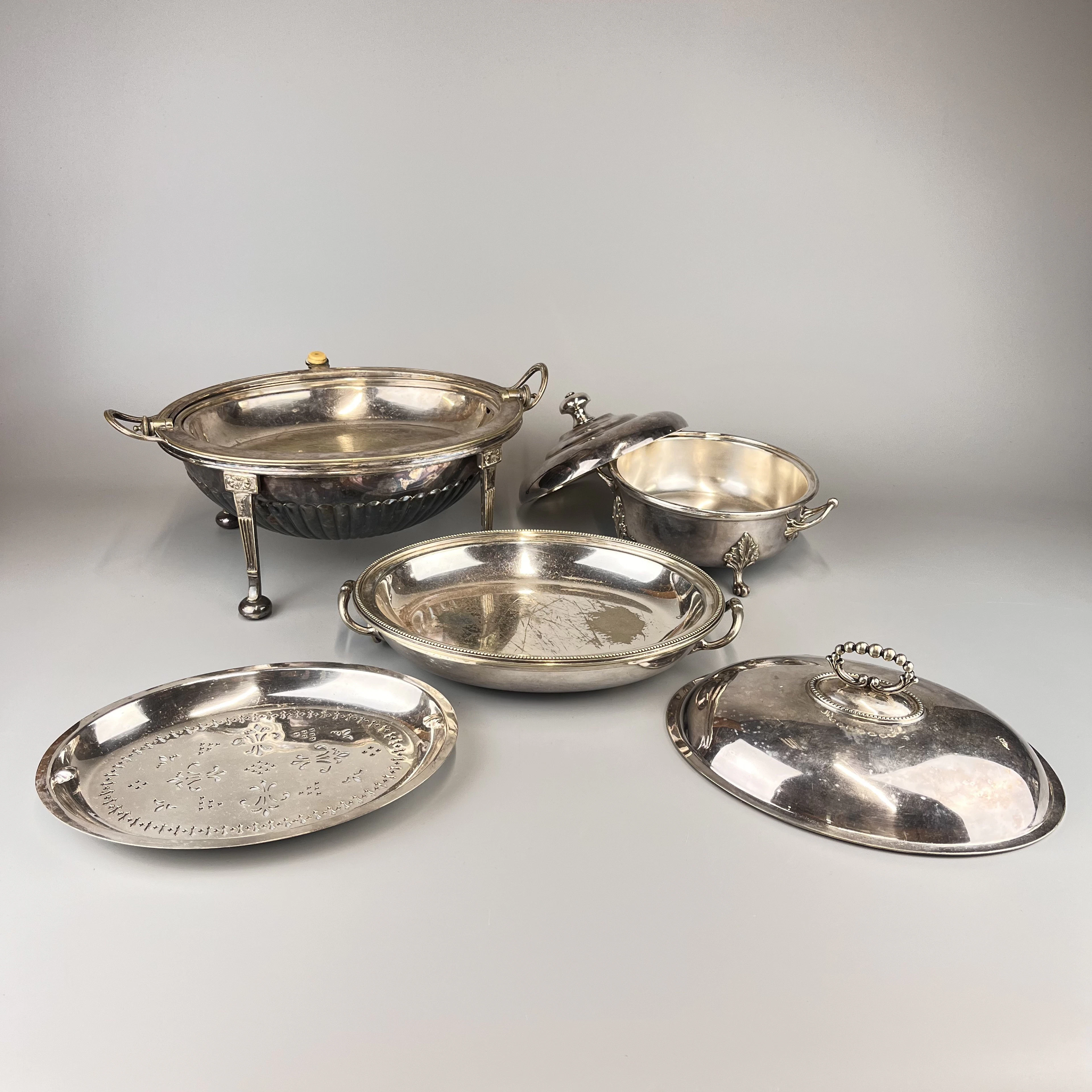 THREE SILVER PLATED SERVING DISHES.
