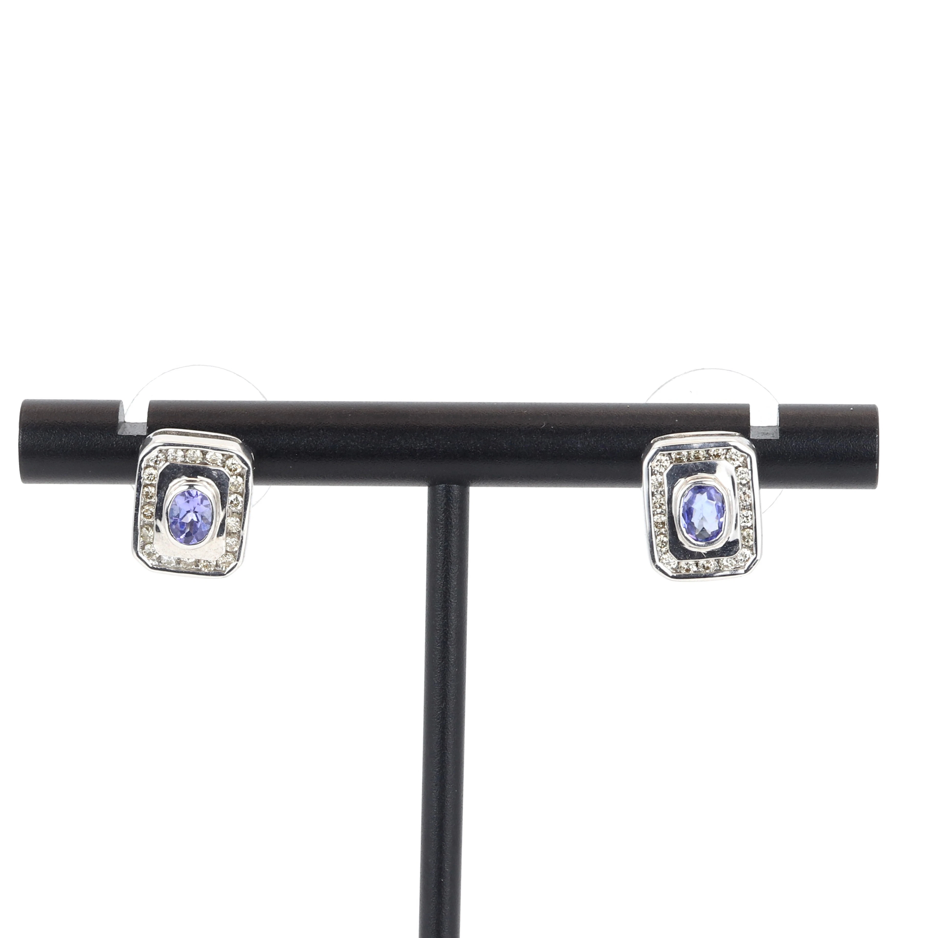 9CT TANZANITE & DIAMOND EARRINGS.