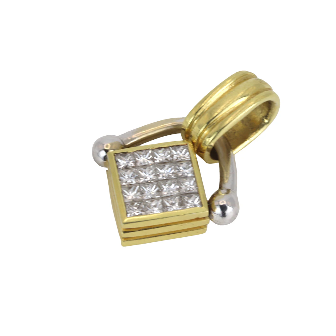 18CT GOLD DIA AND RUBY SWIVEL PENDANT.