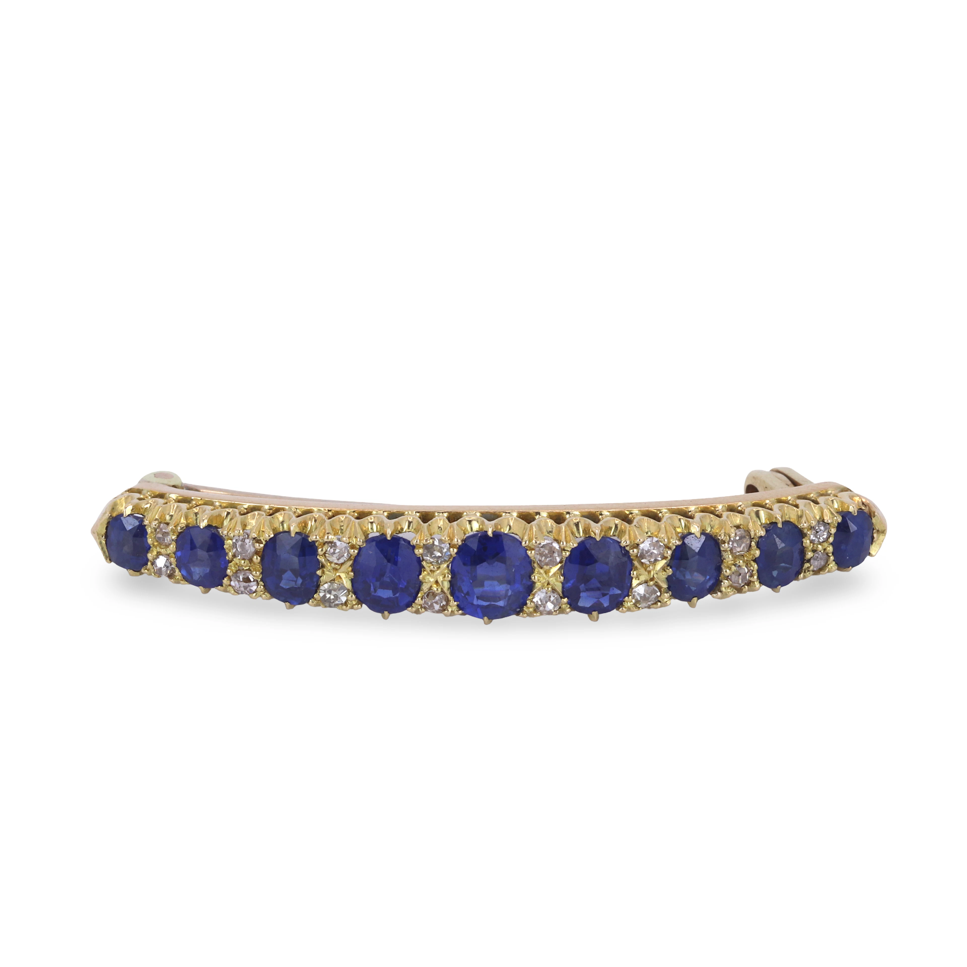 18CT GOLD SAPPHIRE & DIAMOND BROOCH.