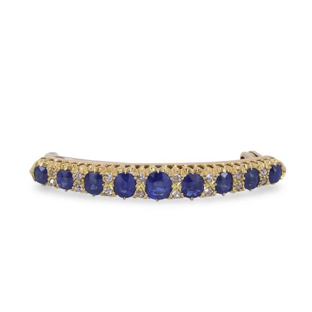 18CT GOLD SAPPHIRE & DIAMOND BROOCH.