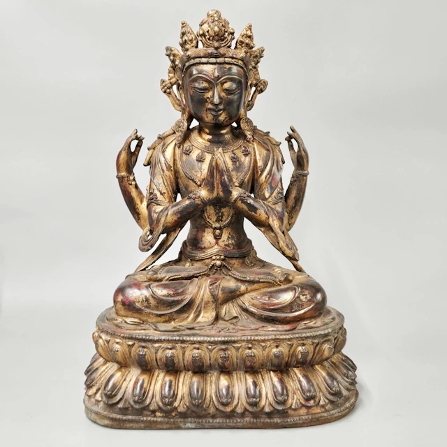 LARGE TIBETAN BRONZE DEITY.
