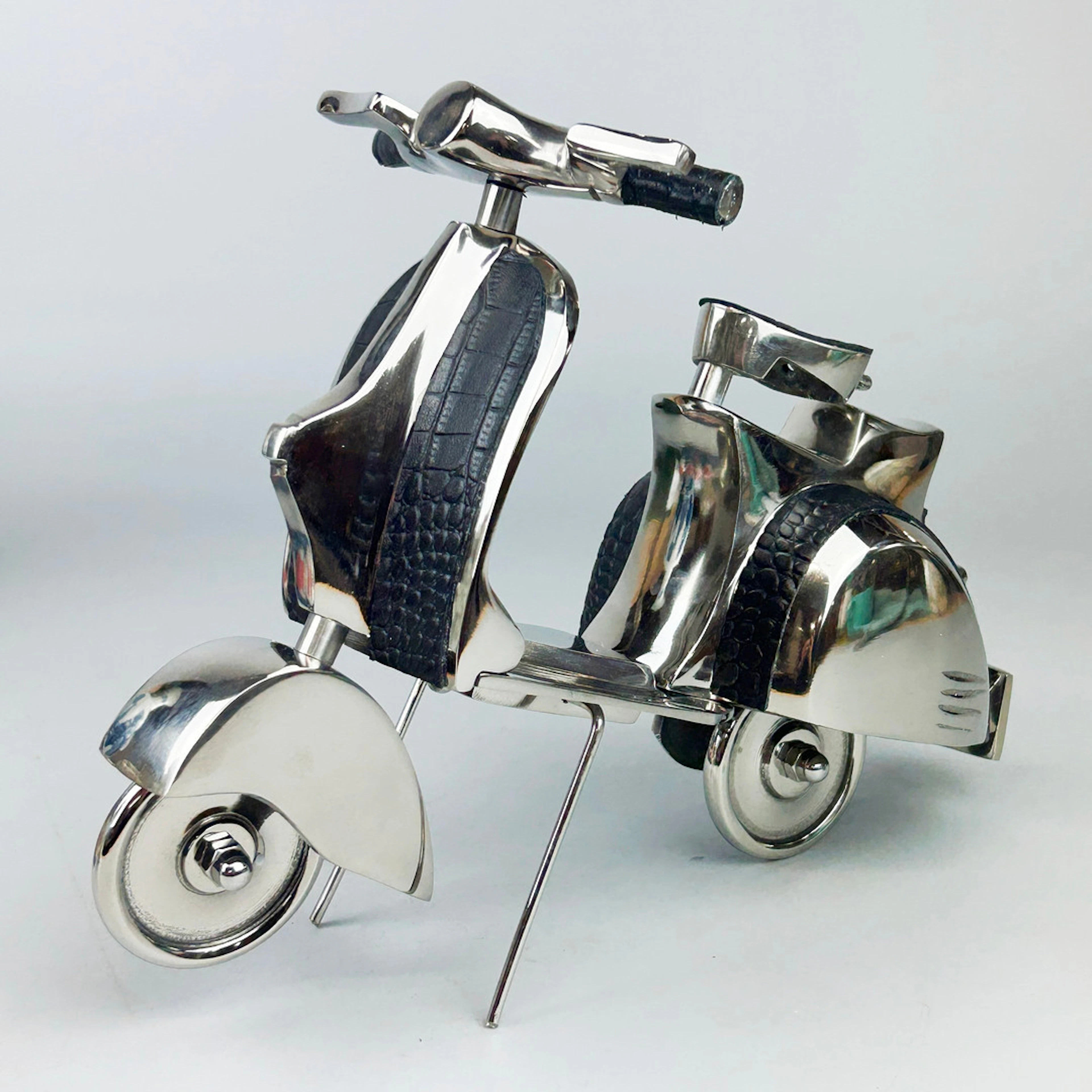 CHROME & LEATHER SCOOTER.