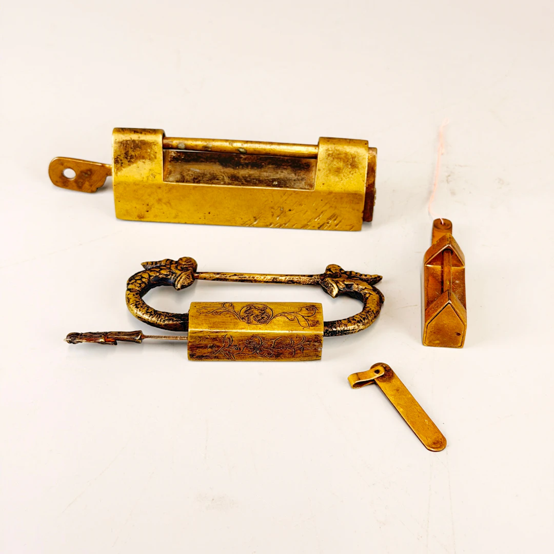 THREE CHINESE BRASS LOCKS.