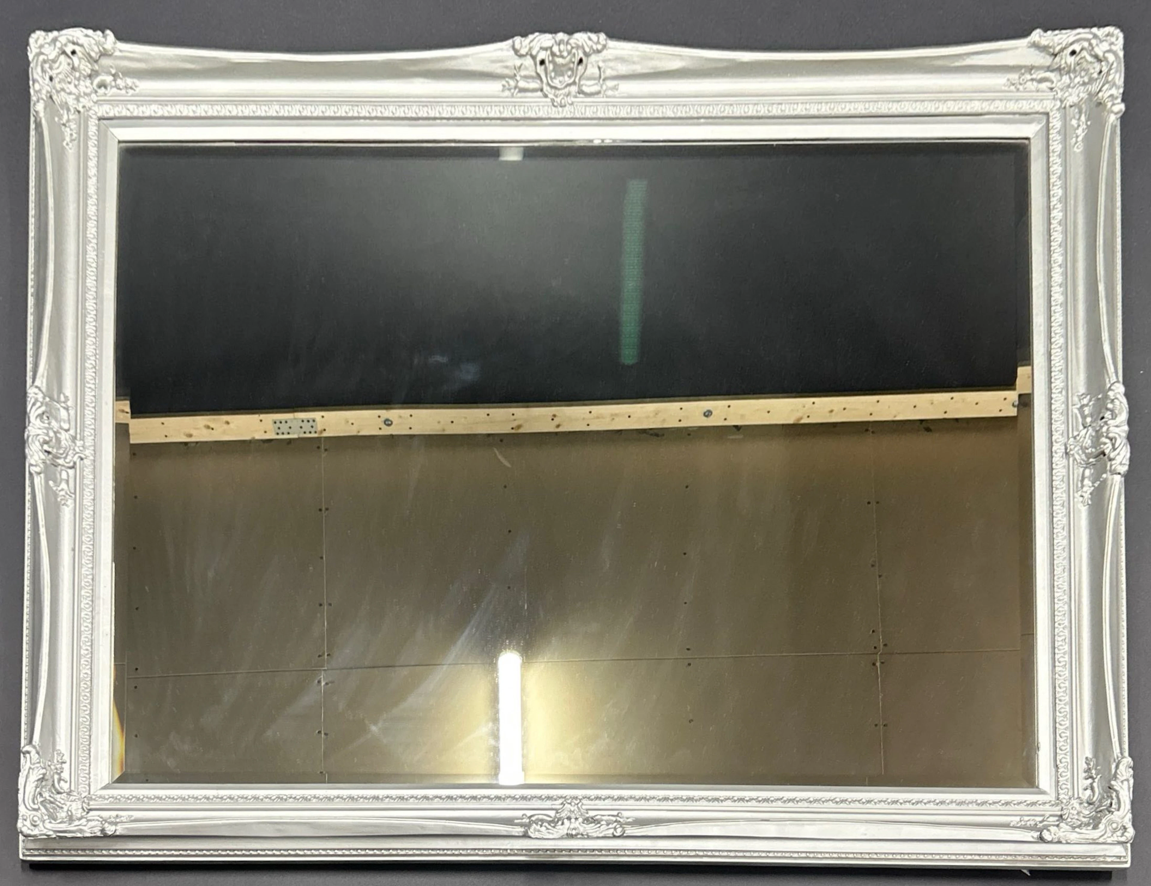 ORNATE FRAMED MIRROR.