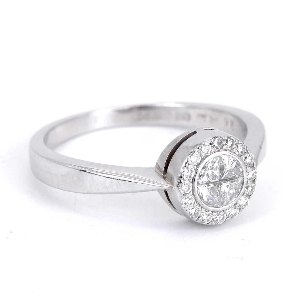 18CT GOLD DIAMOND RING.