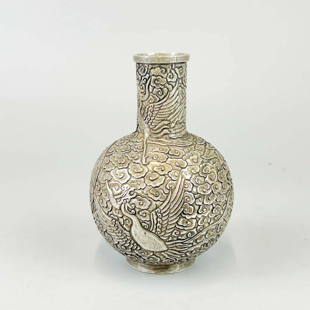 CHINESE WHITE METAL VASE.
