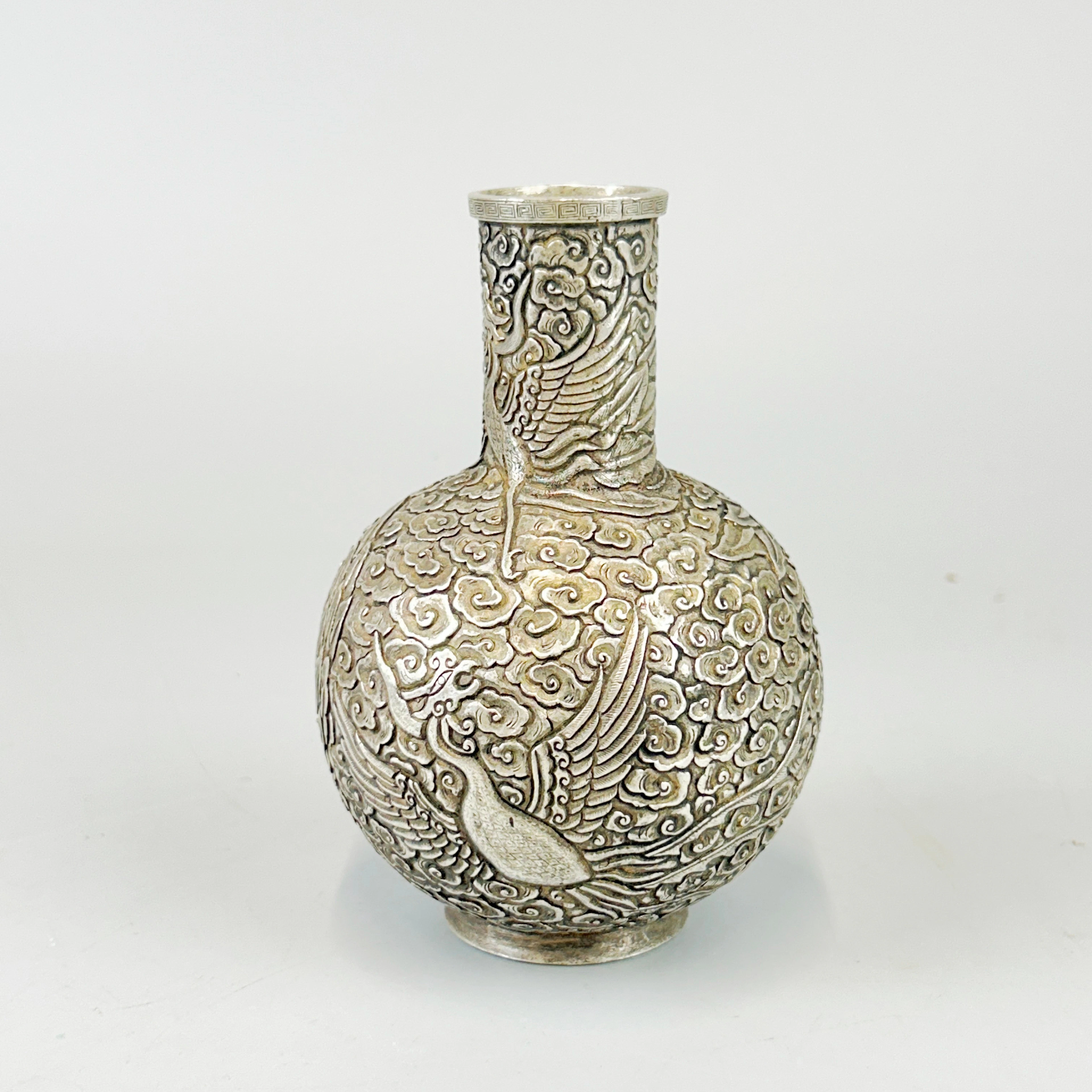 CHINESE WHITE METAL VASE.