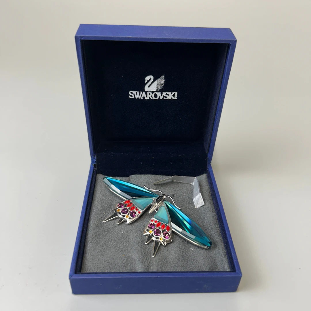 BOXED SWAROVSKI BROOCH.