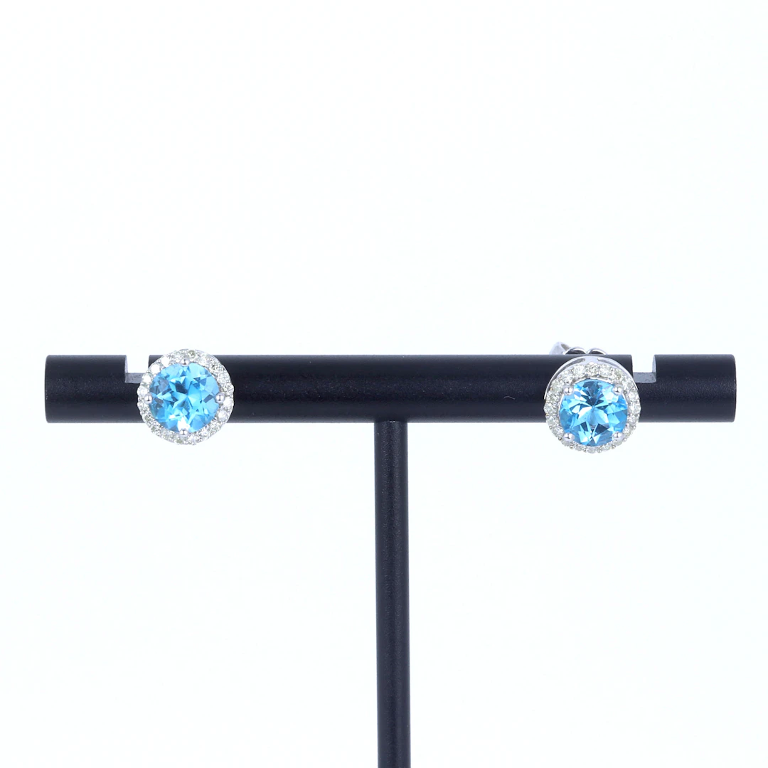 BLUE TOPAZ AND DIAMOND 9CT EARRINGS.