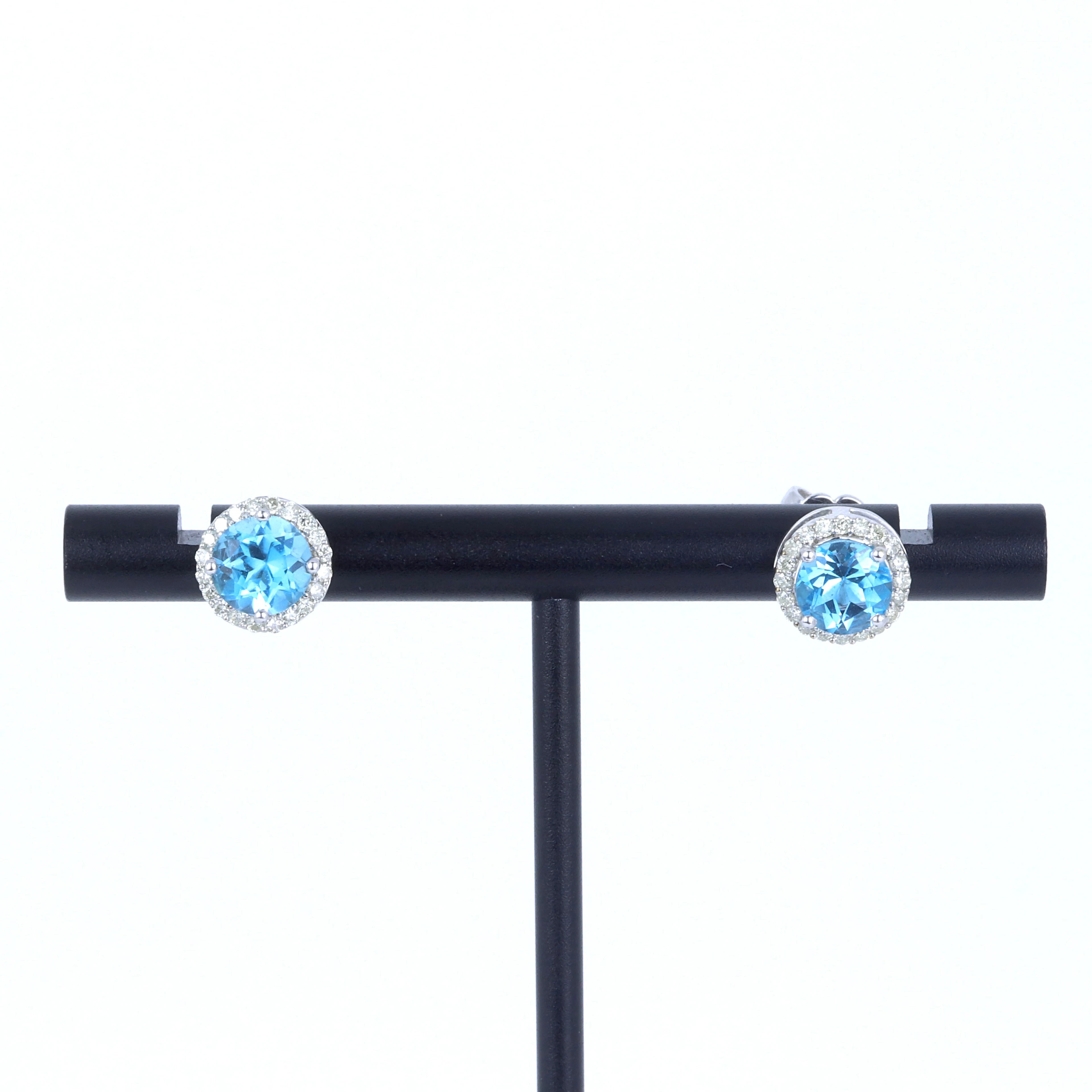 BLUE TOPAZ AND DIAMOND 9CT EARRINGS.