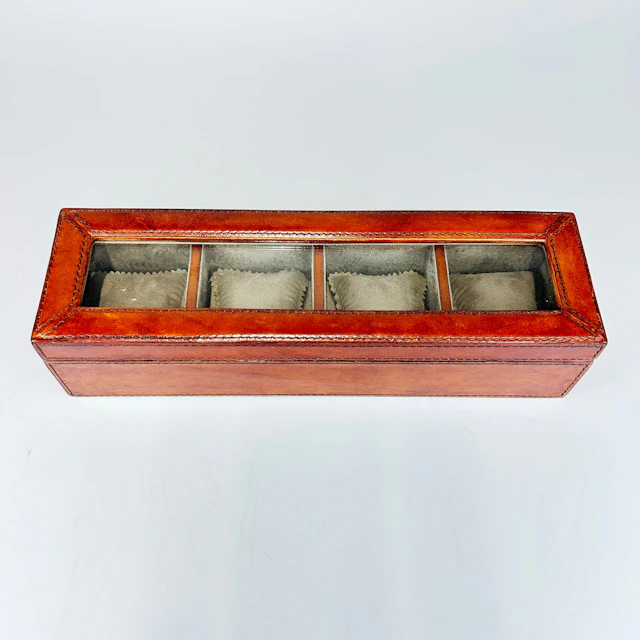 TAN LEATHER WATCH BOX.