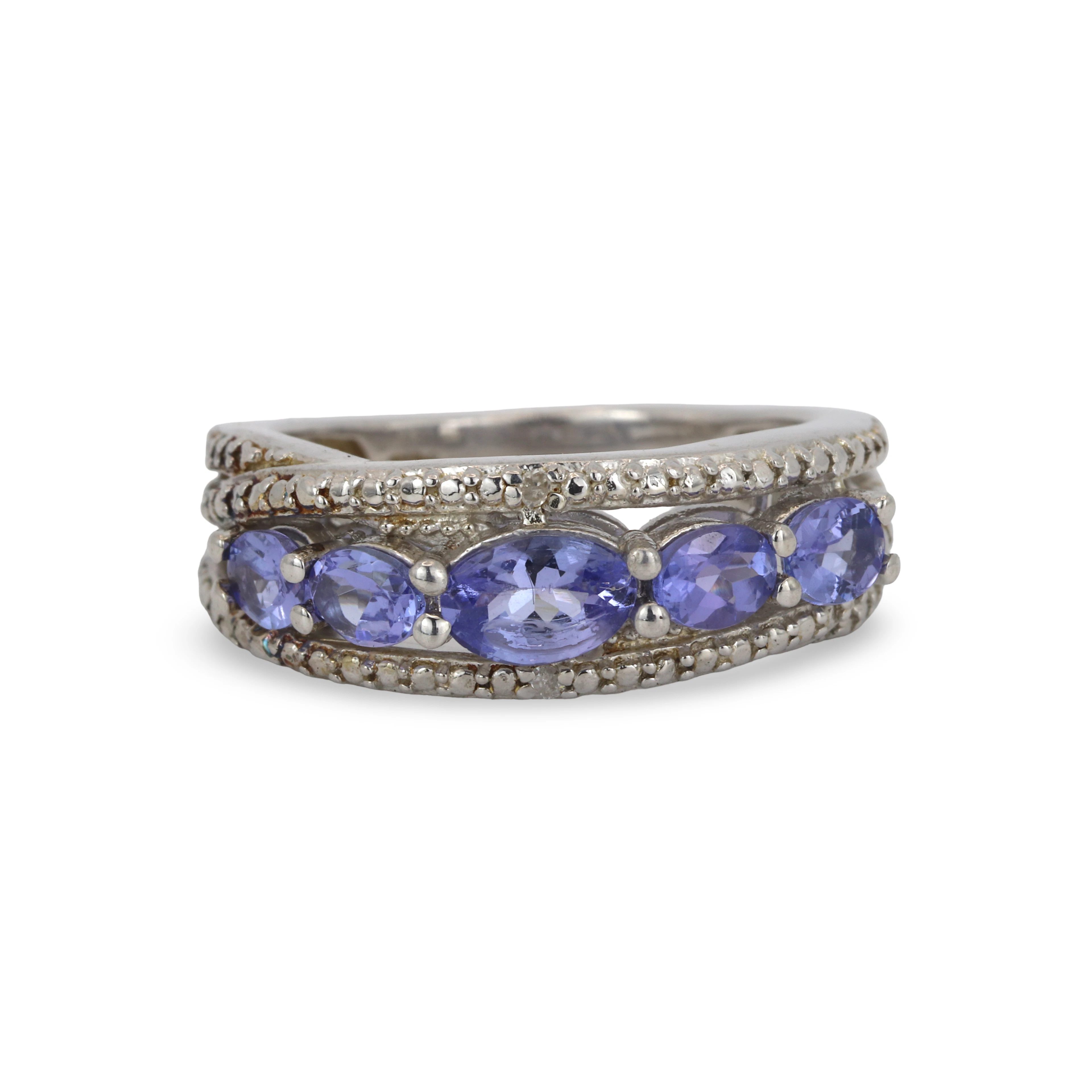 TANZANITE AND DIAMOND SILVER RING.