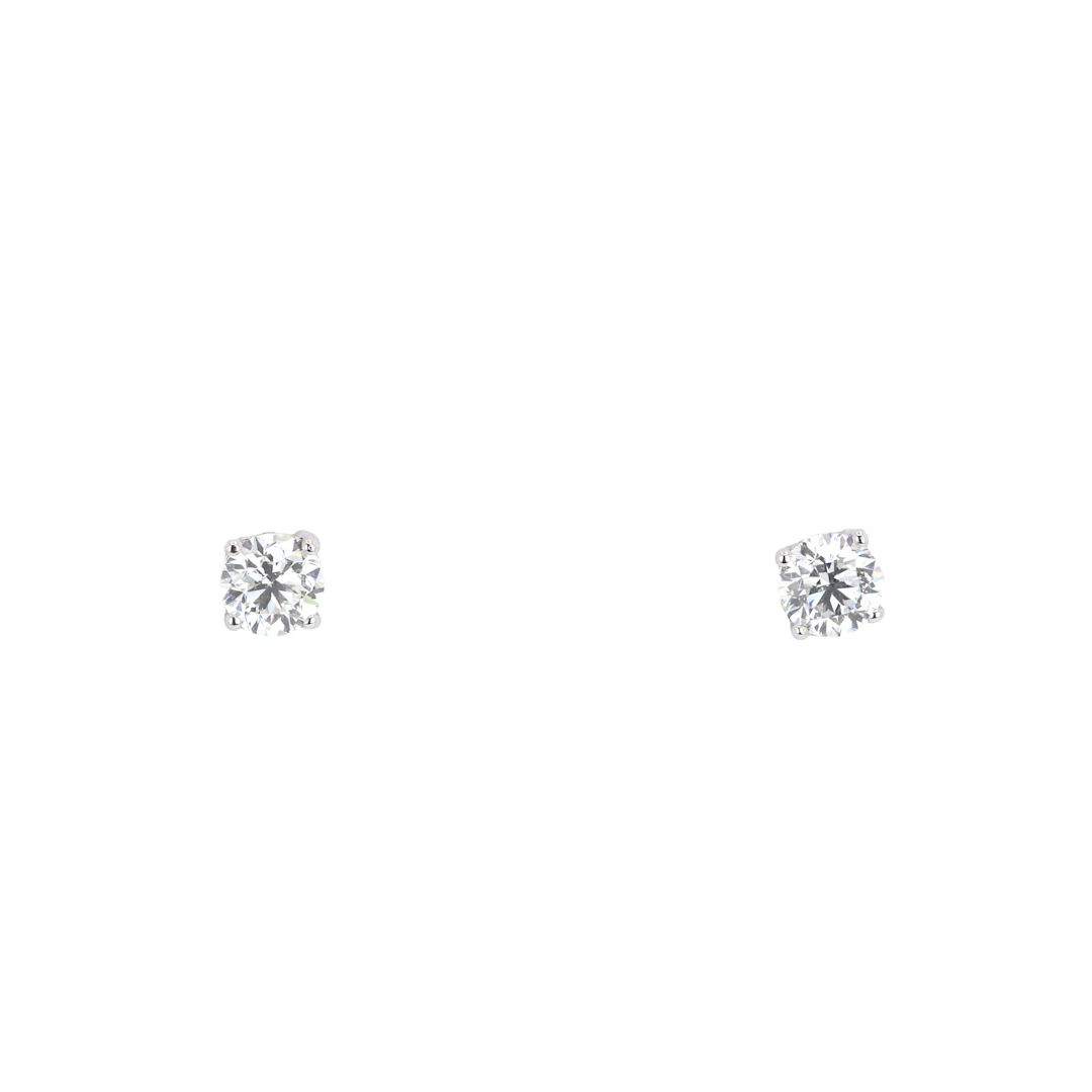 18CT WHITE GOLD 0.98CT SOLITAIRE EARRINGS.