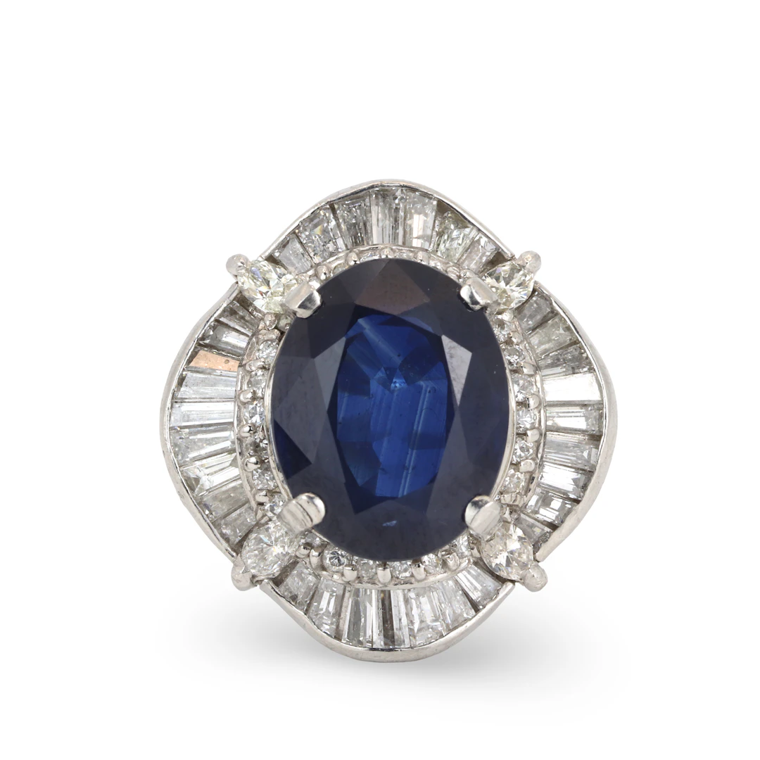 PLATINUM SAPPHIRE & DIAMOND RING.