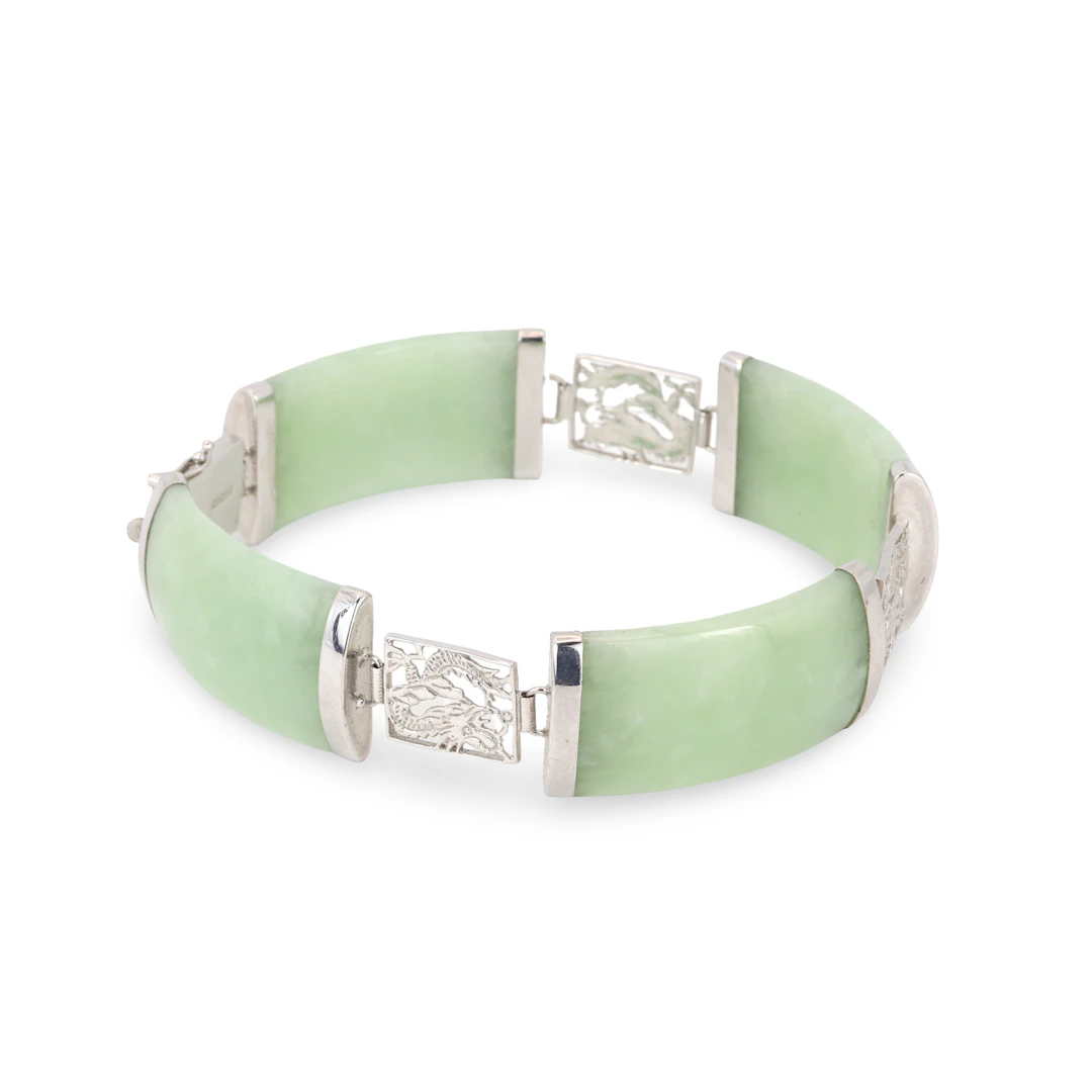 14CT GOLD JADE BRACELET.