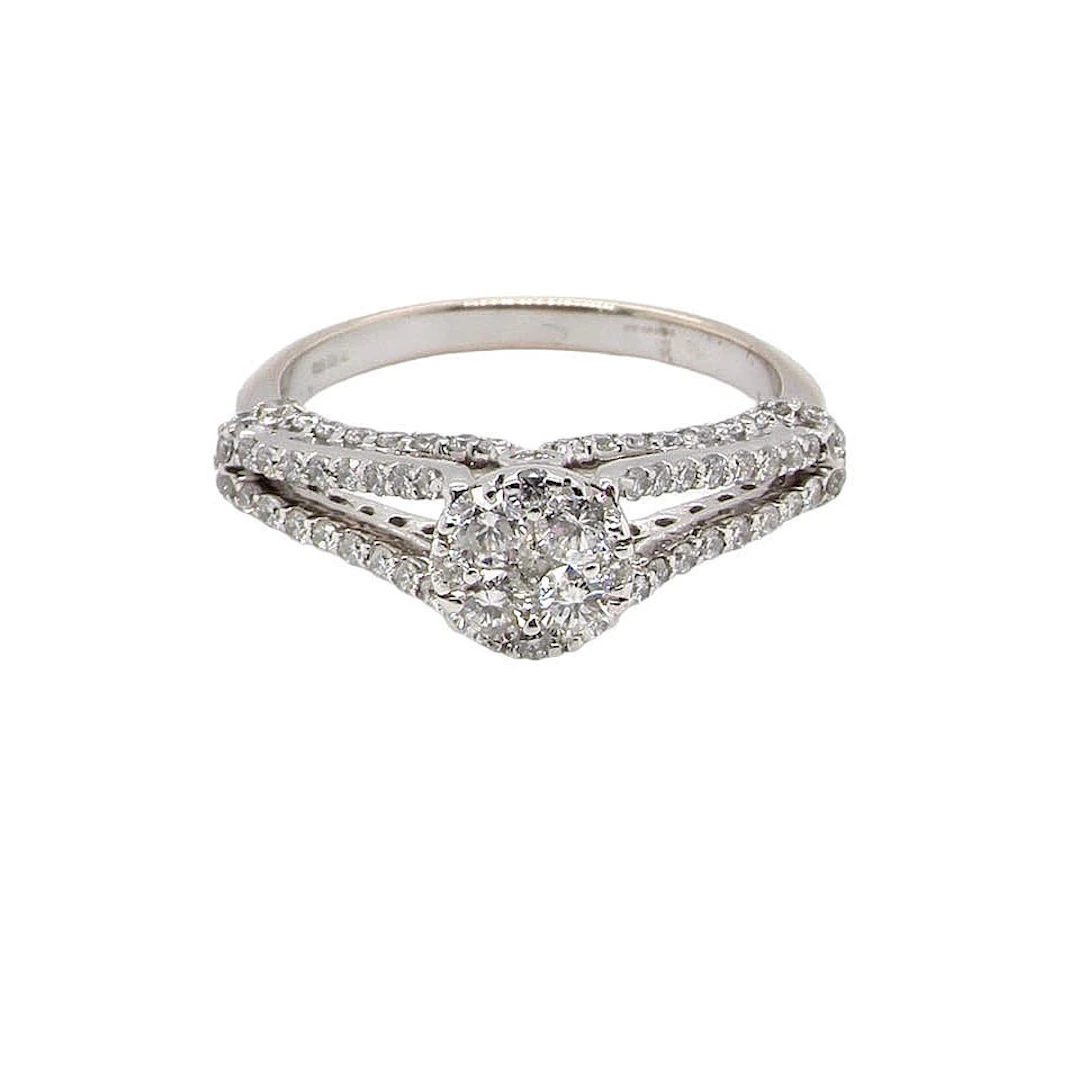 18CT GOLD DIAMOND RING.