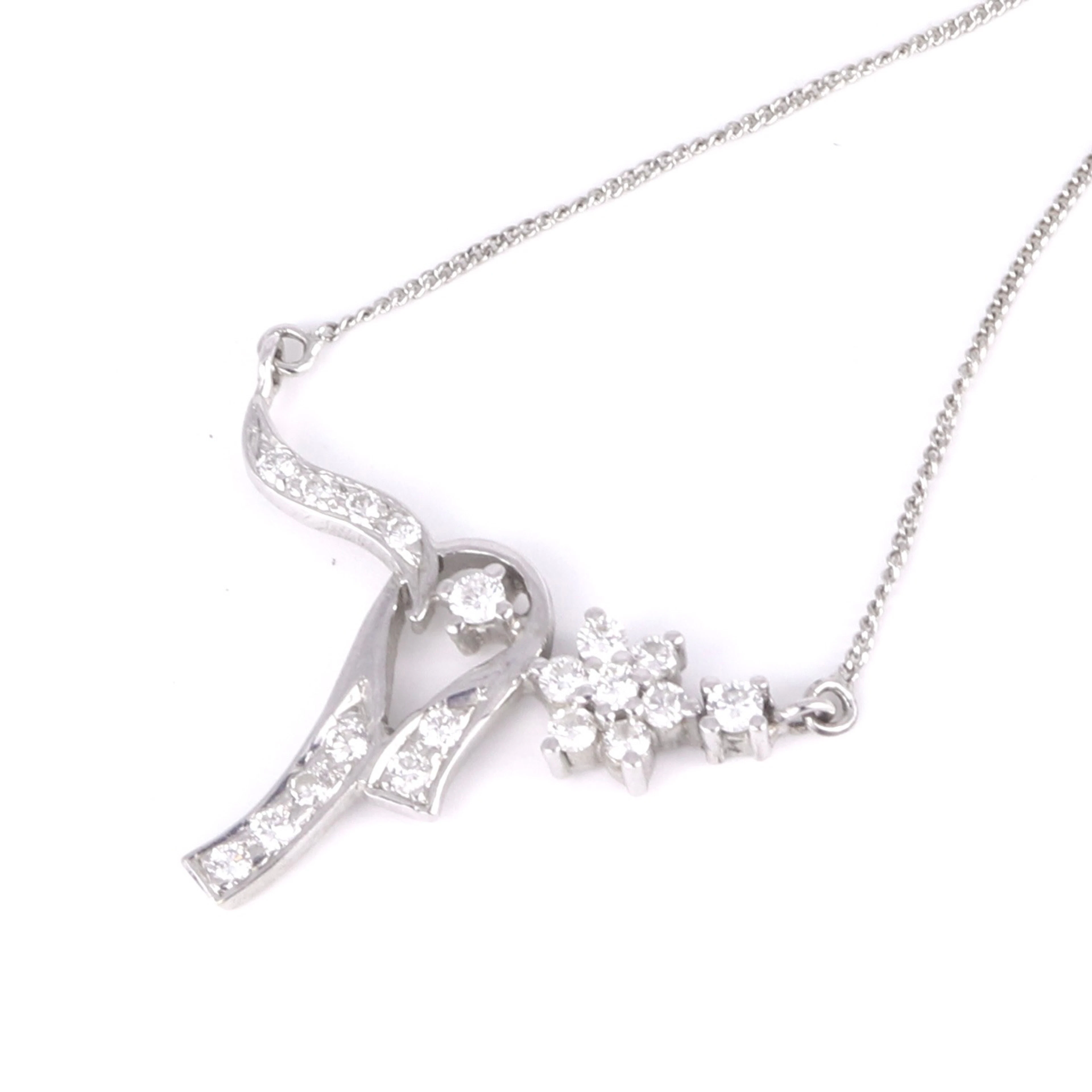 18CT GOLD DIAMOND NECKLACE.