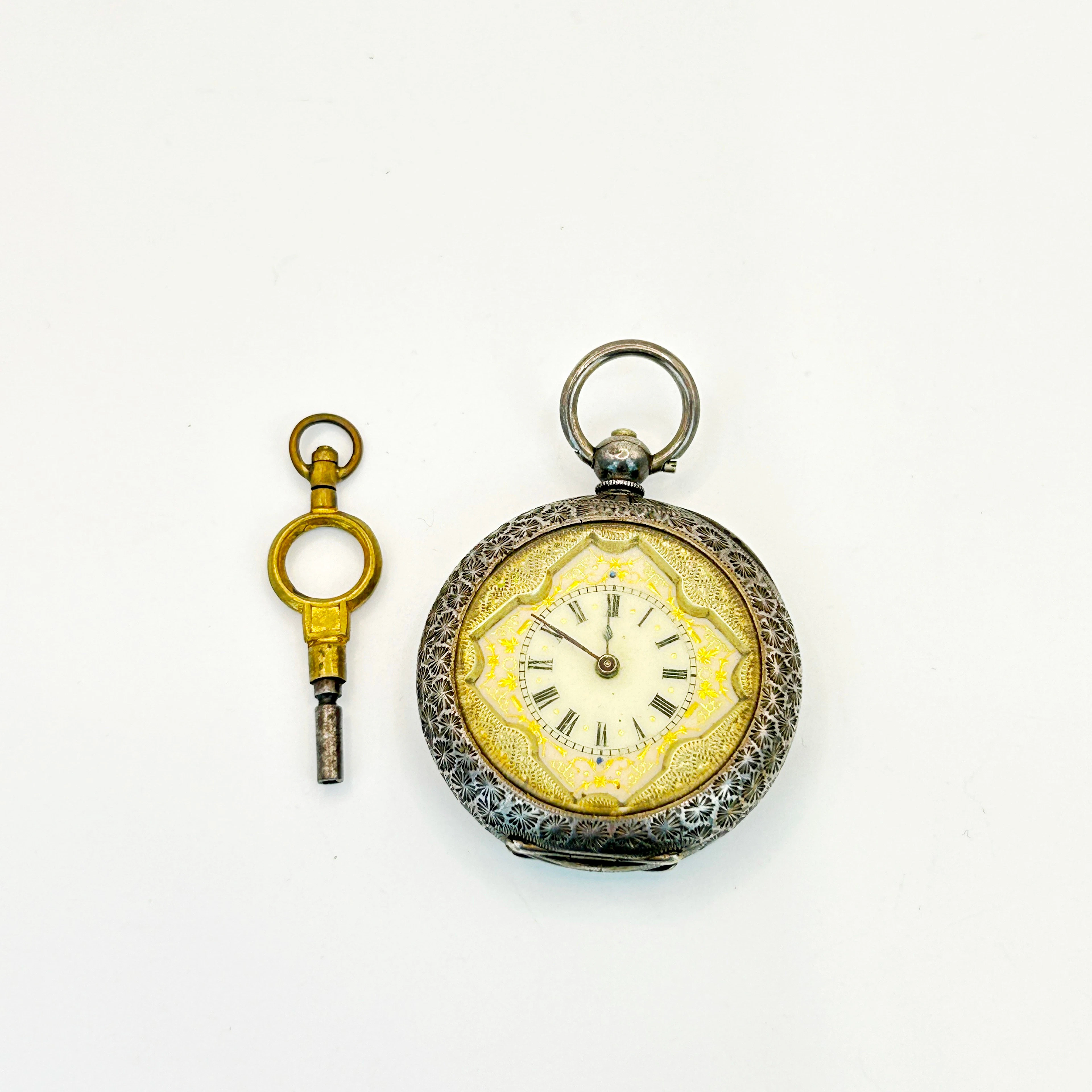 ANTIQUE SILVER POCKET WATCH.