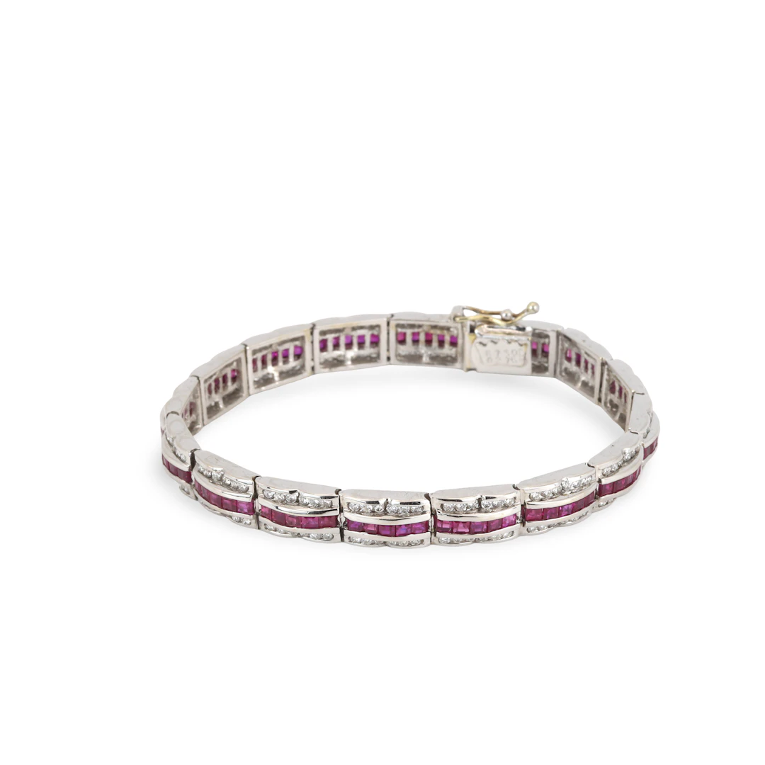 18CT GOLD RUBY & DIAMOND BRACELET.