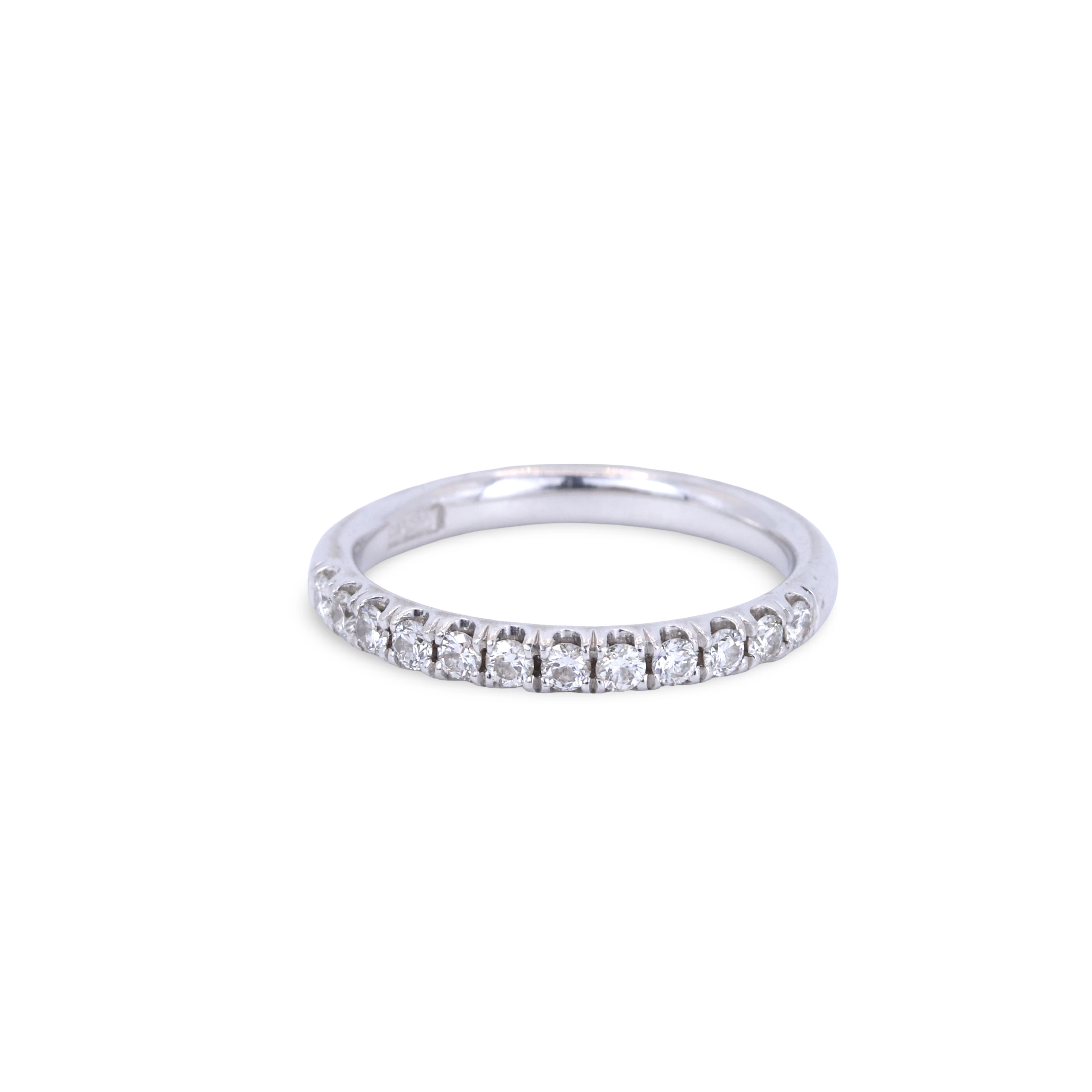 PLATINUM DIAMOND HALF ETERNITY RING.