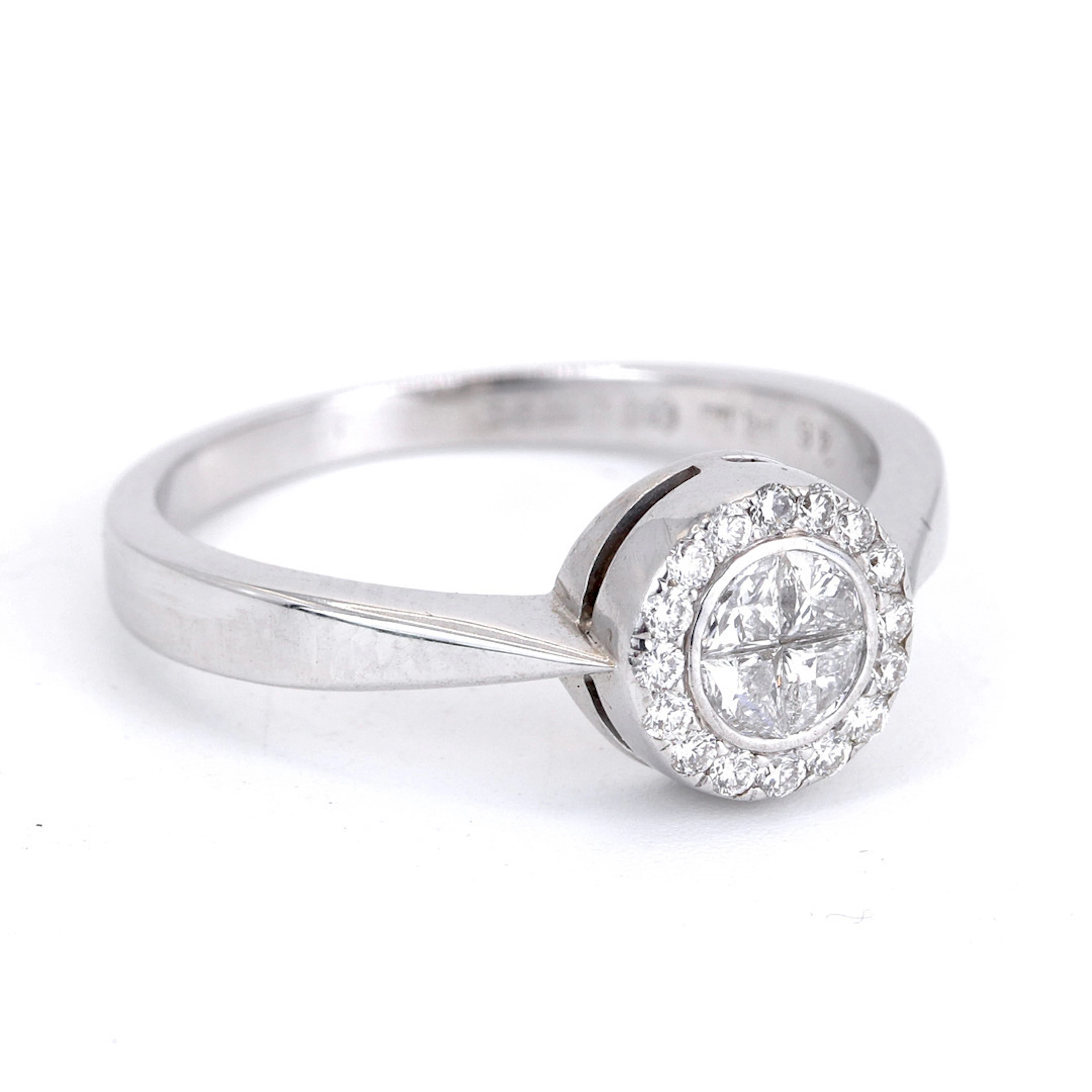18CT GOLD DIAMOND RING.