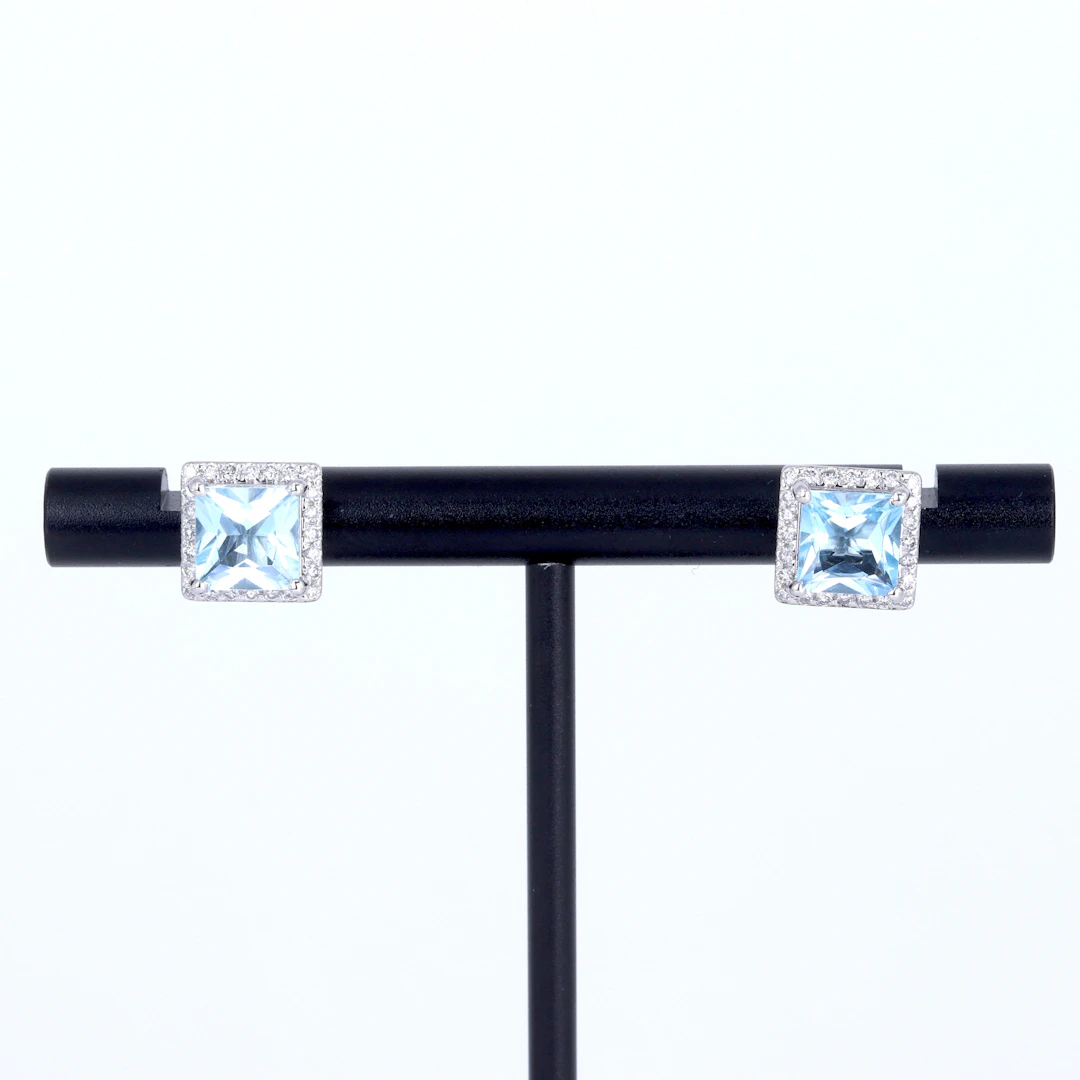 PLATINUM BLUE TOPAZ AND DIAMOND EARRINGS.