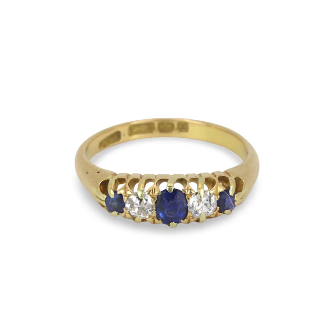 18CT GOLD SAPPHIRE & DIAMOND RING.
