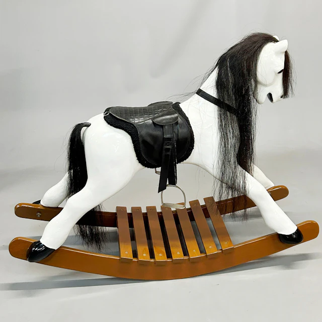 HEAVY QUALITY VINTAGE ROCKING HORSE.