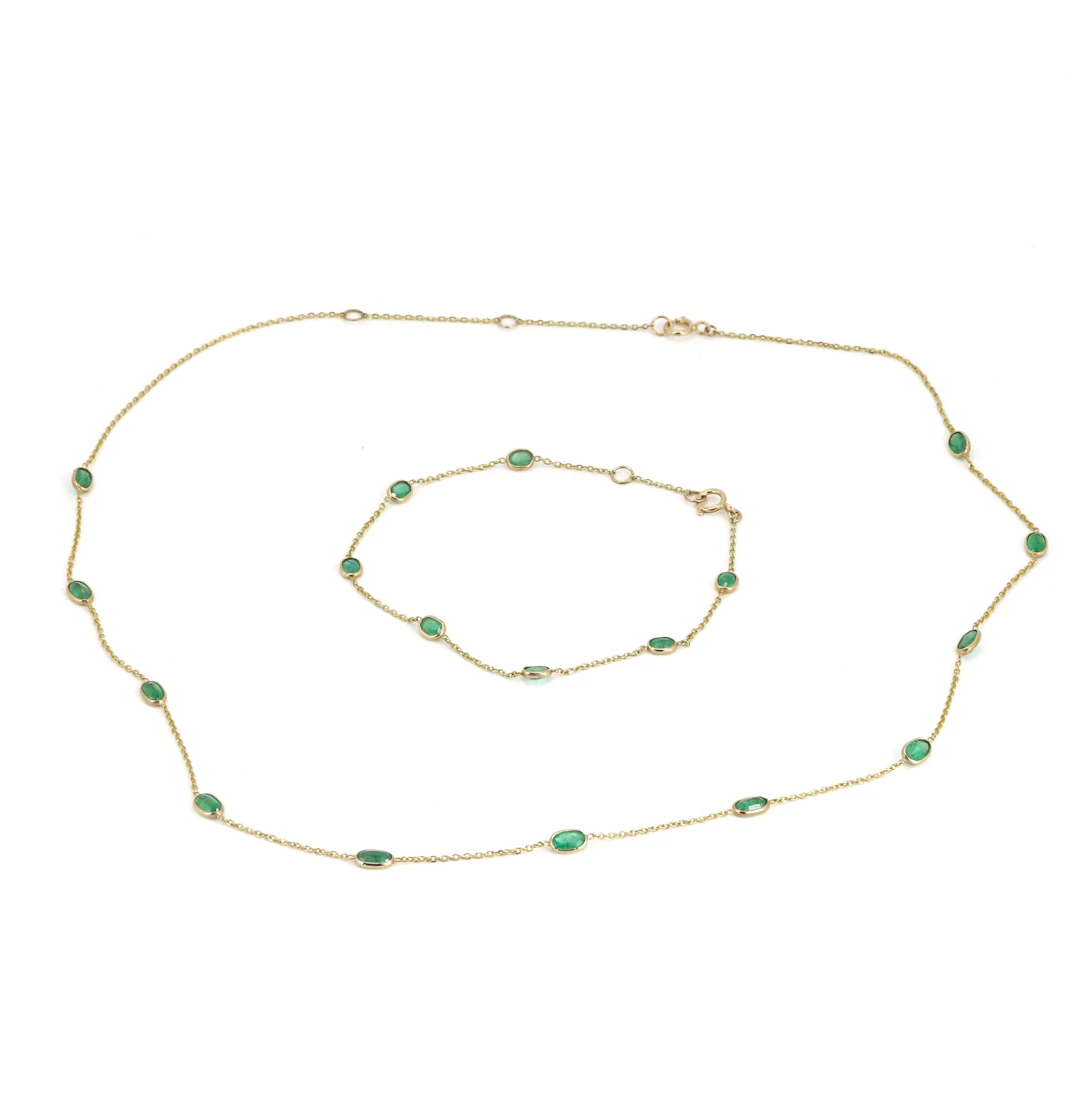 14CT GOLD EMERALD JEWELLERY SET.