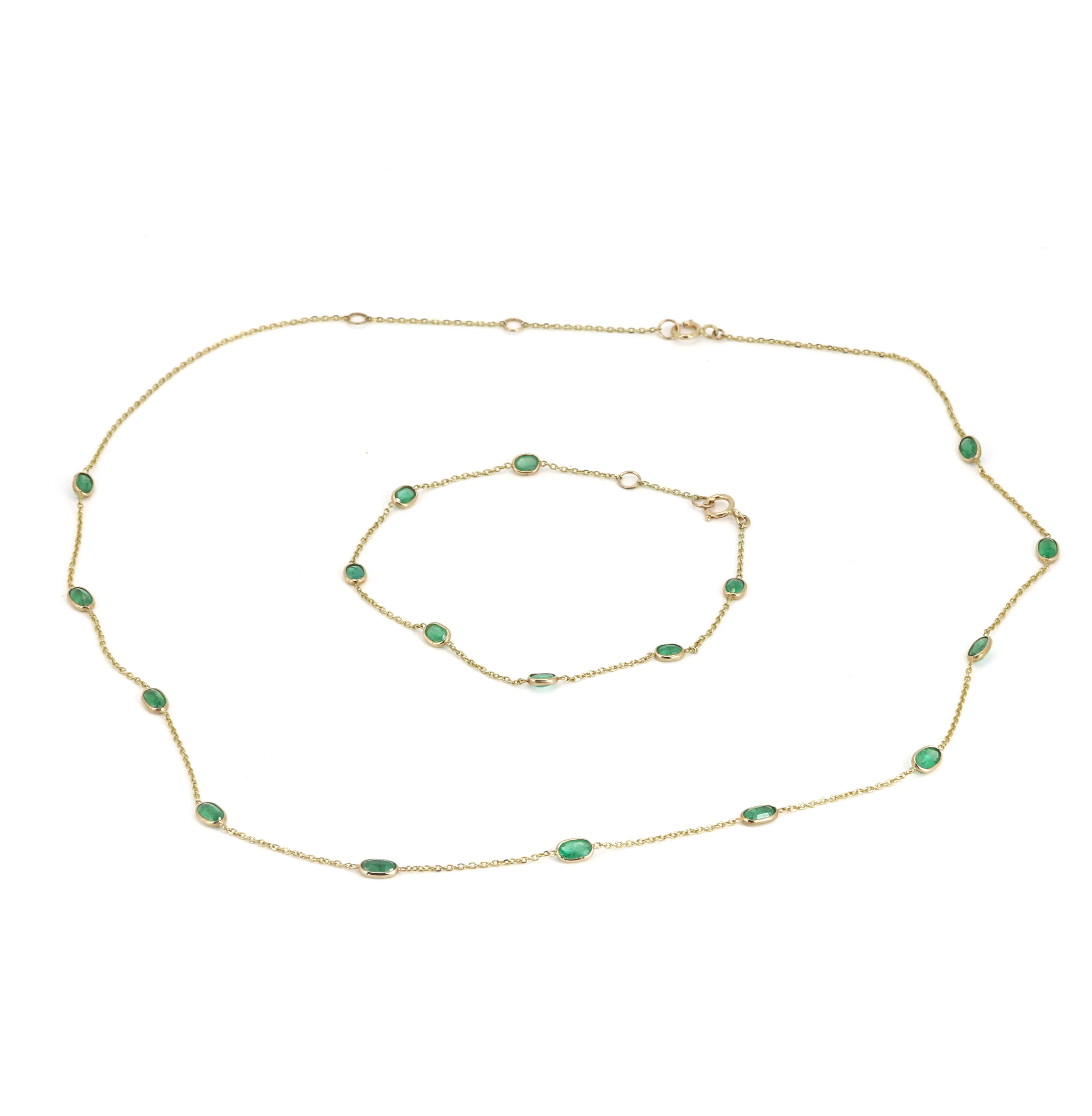 14CT GOLD EMERALD JEWELLERY SET.
