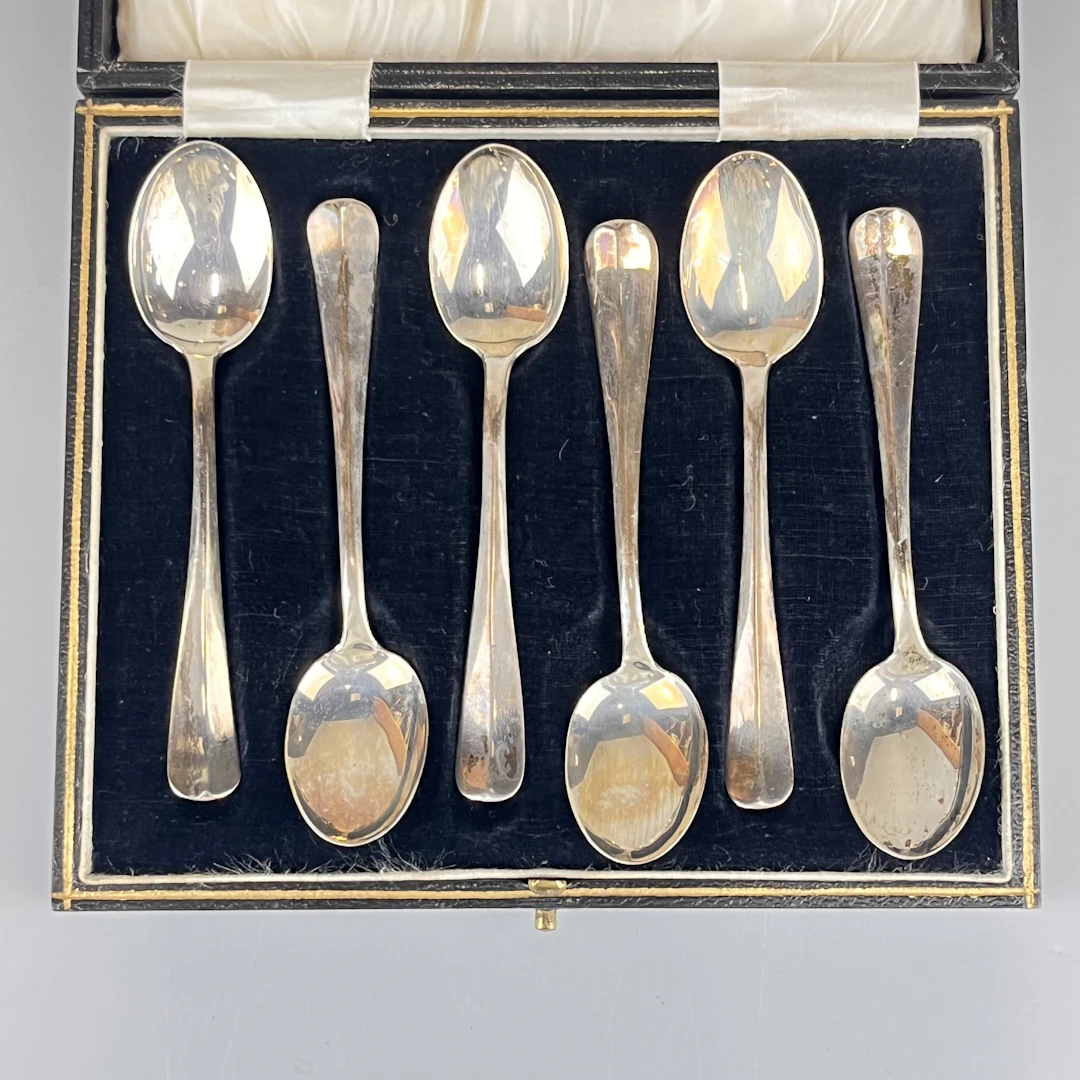 SILVER TEASPOONS.