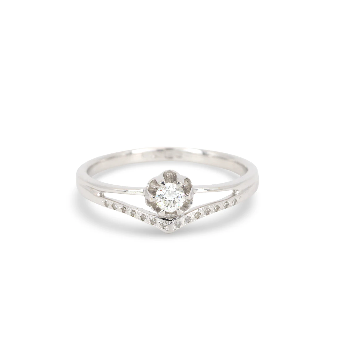 14CT GOLD DIAMOND RING.