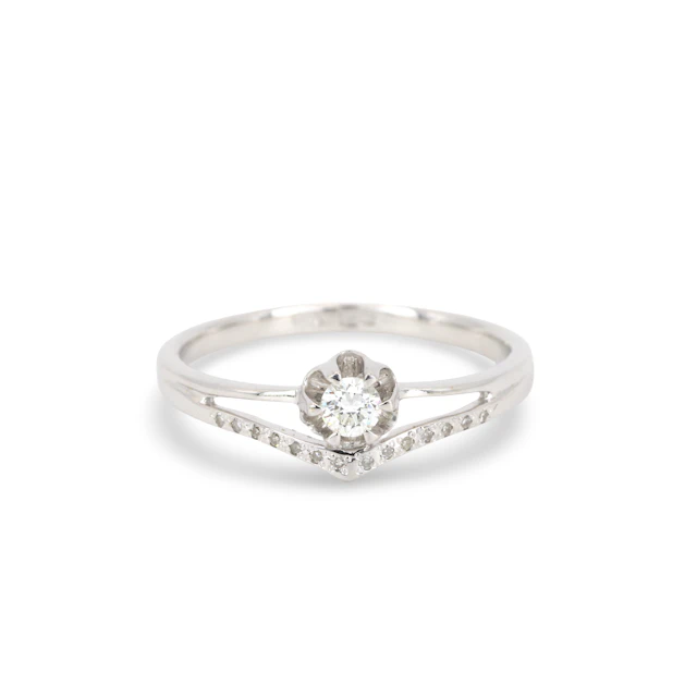 14CT GOLD DIAMOND RING.