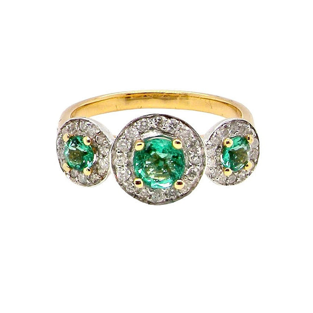 18CT EMERALD & DIAMONDS RING.