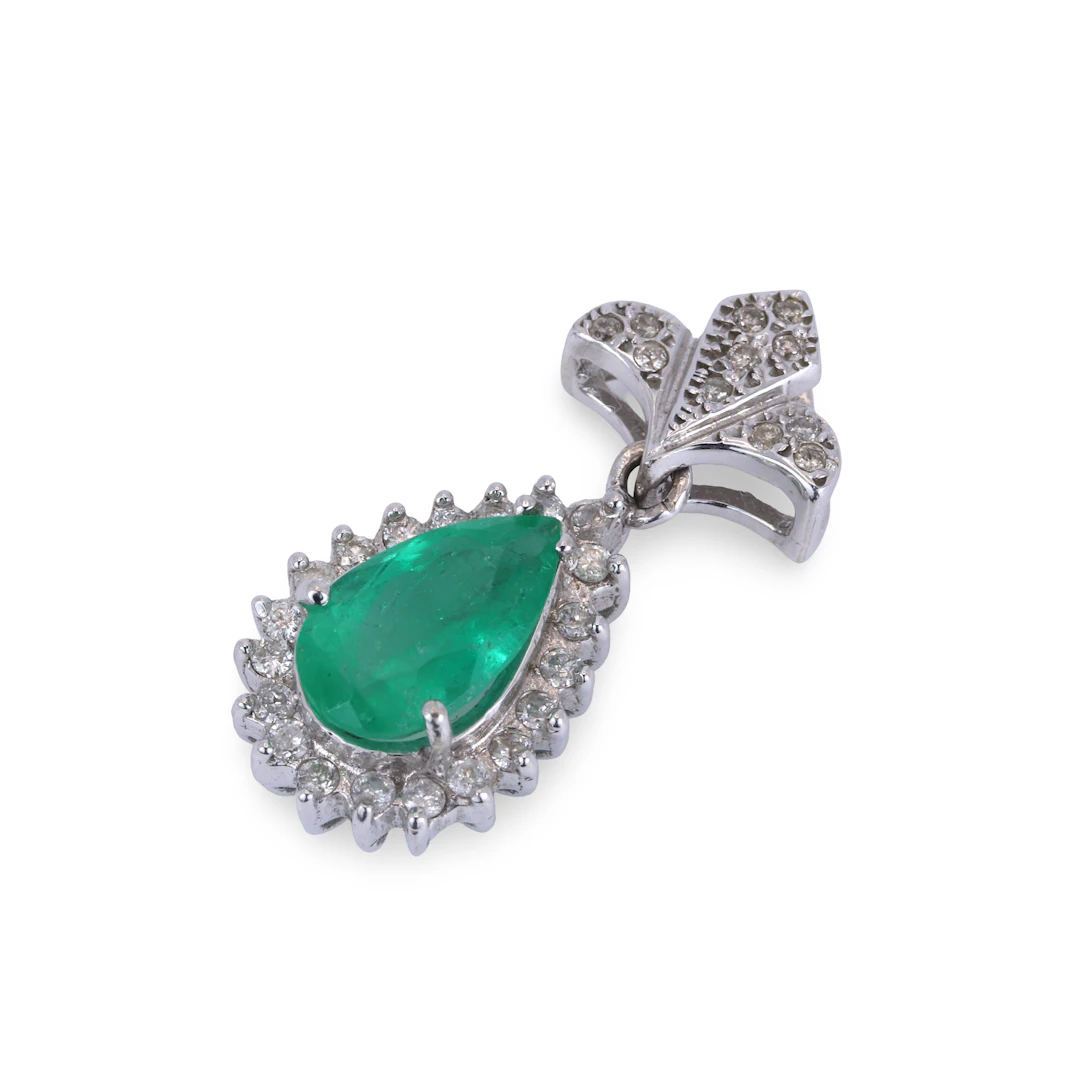 18CT GOLD EMERALD & DIAMOND PENDANT.