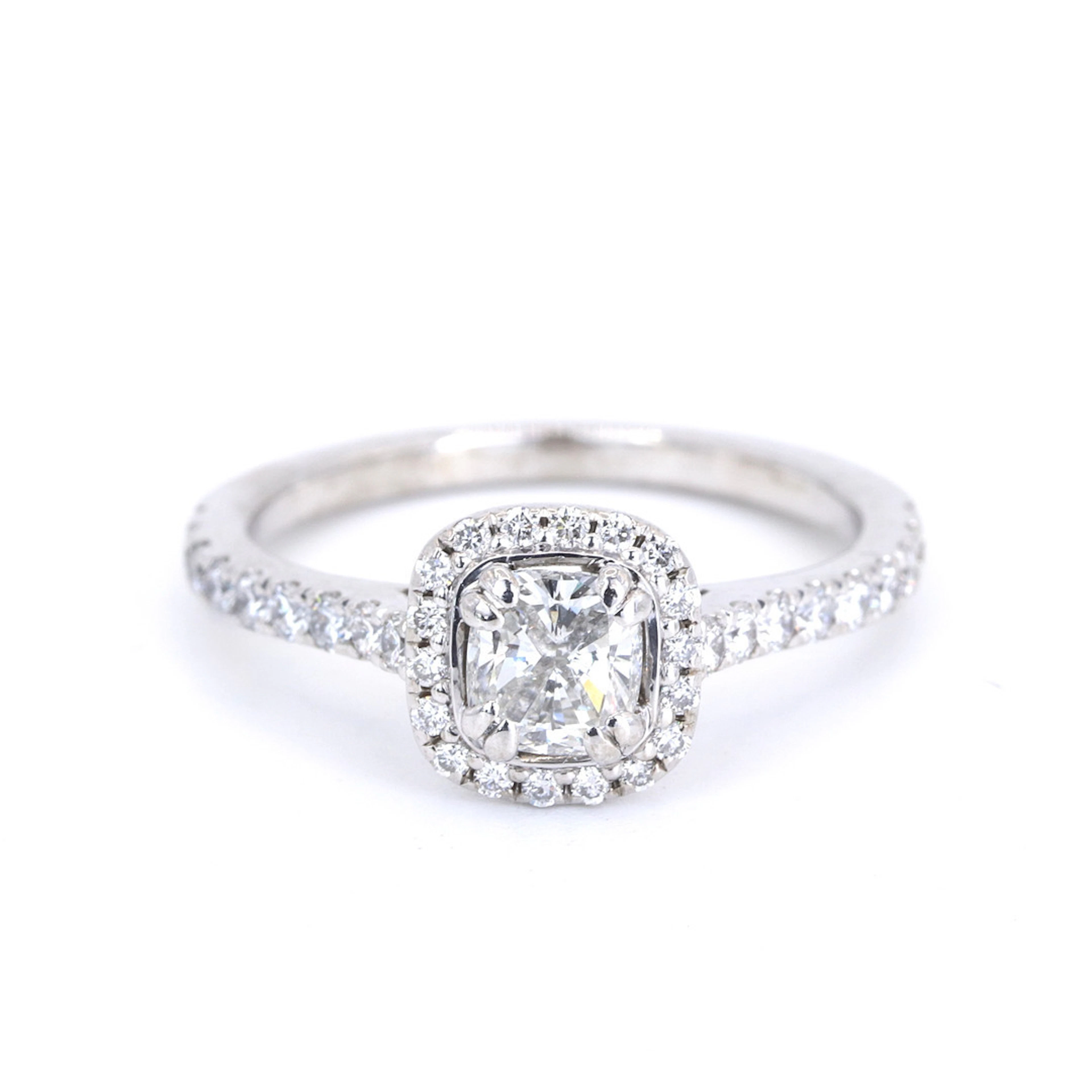 0.9 CT DIAMOND HALO RING.