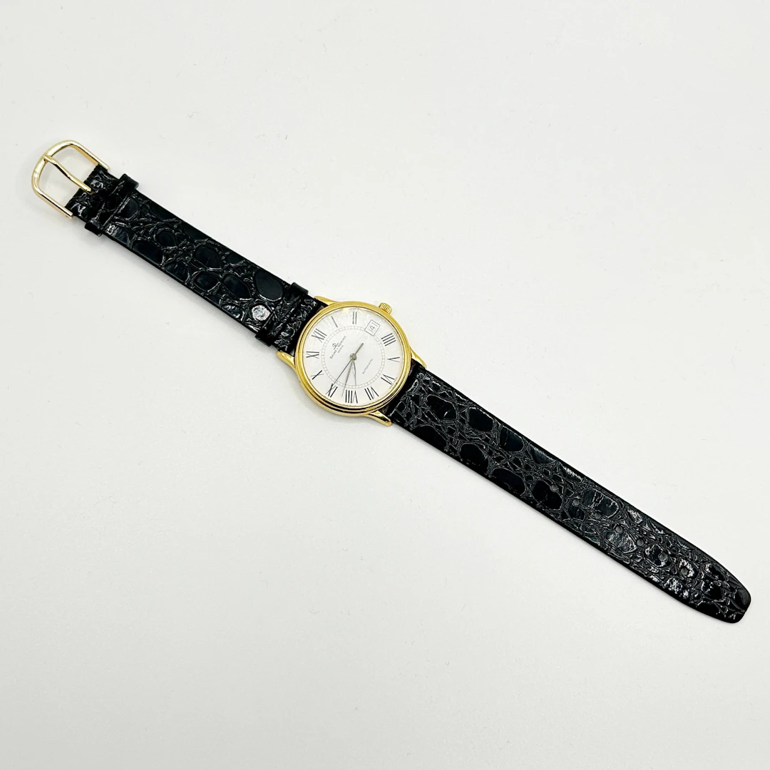 18CT BAUM AND MERCIER WATCH.