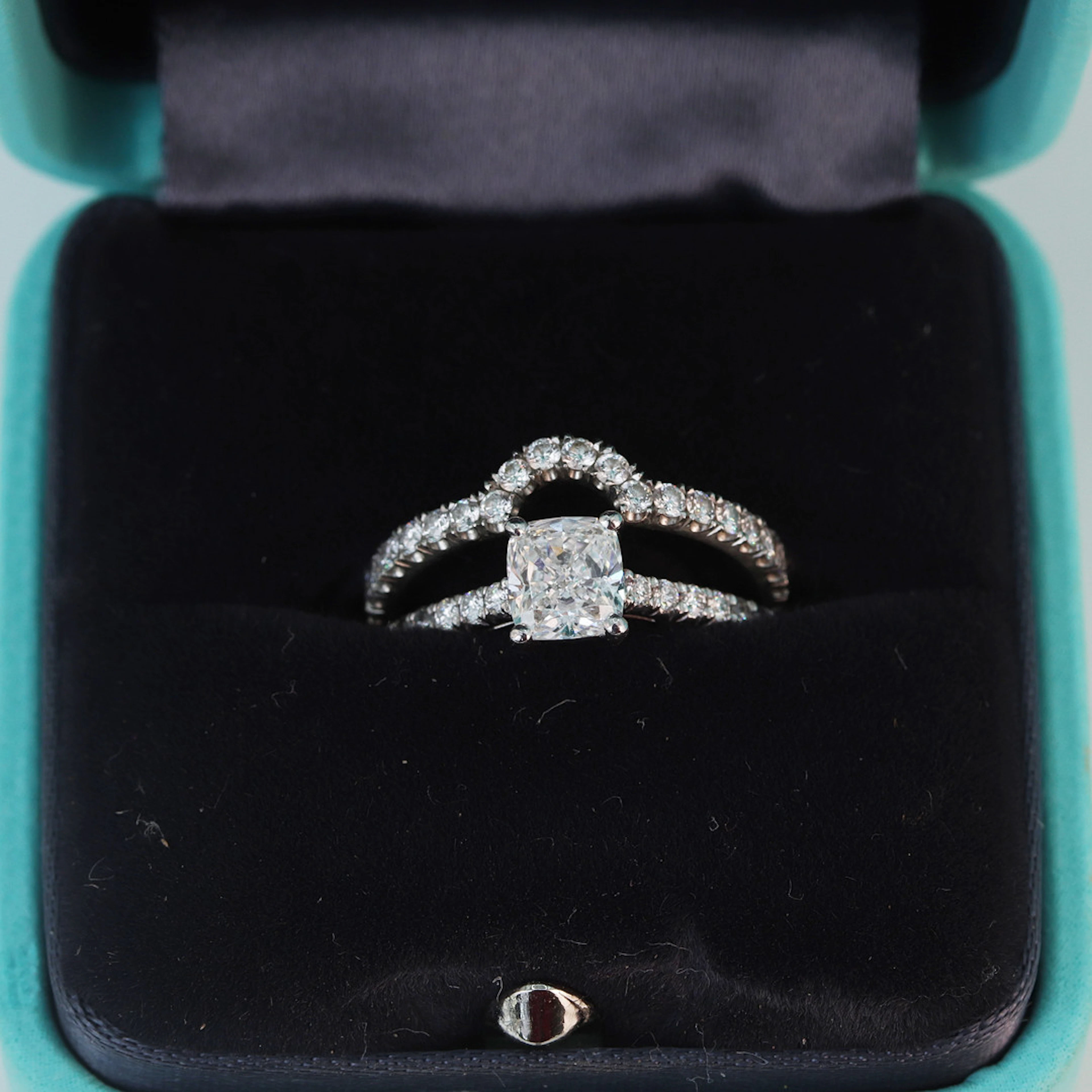 PLATINUM TIFFANY DIAMOND RINGS.