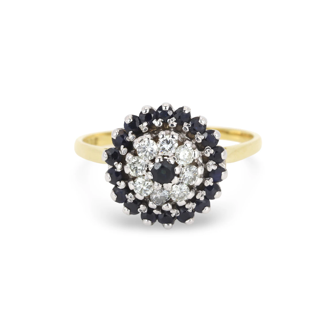 18CT GOLD SAPPHIRE & DIAMOND RING.
