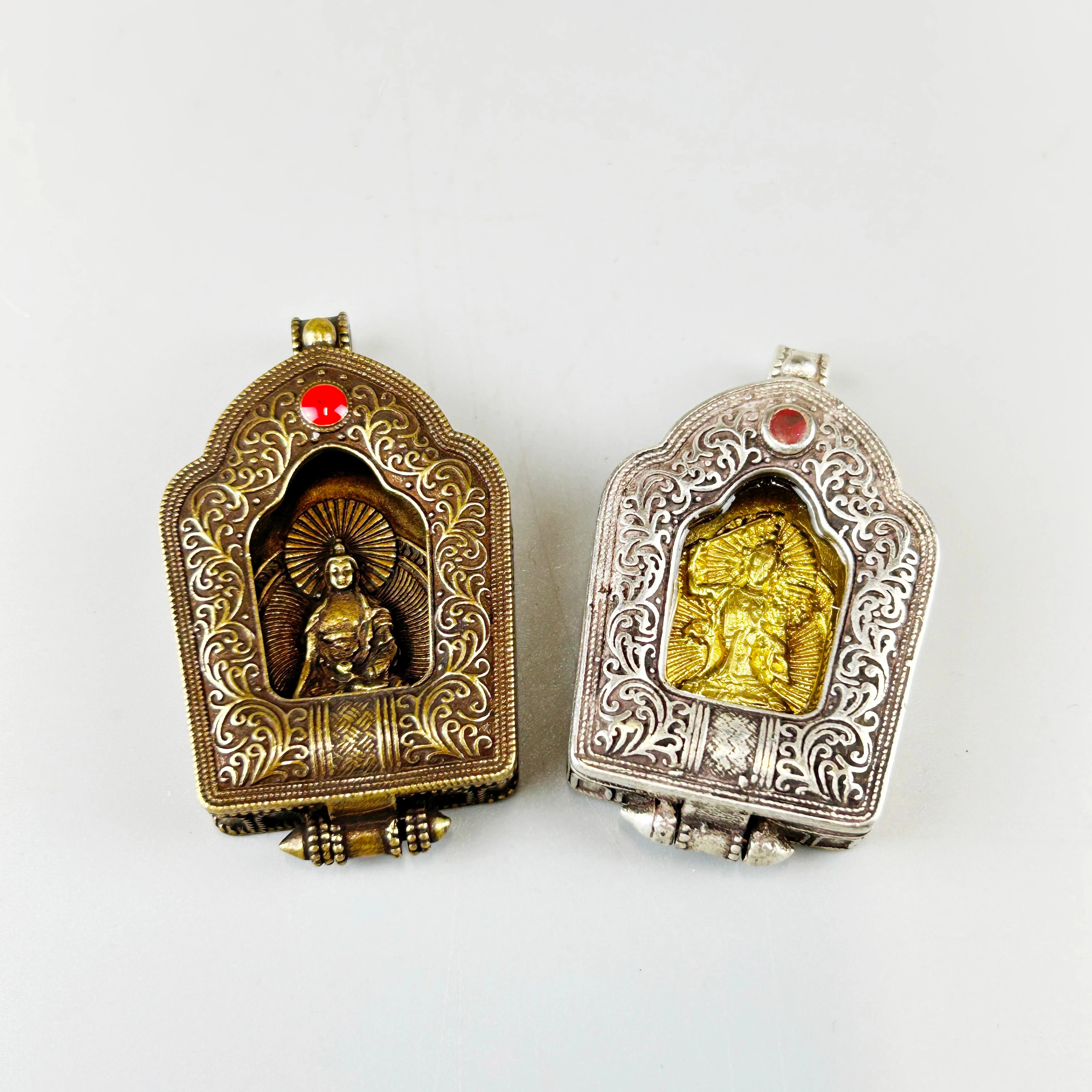 TIBETAN BUDDHA AMULETS.