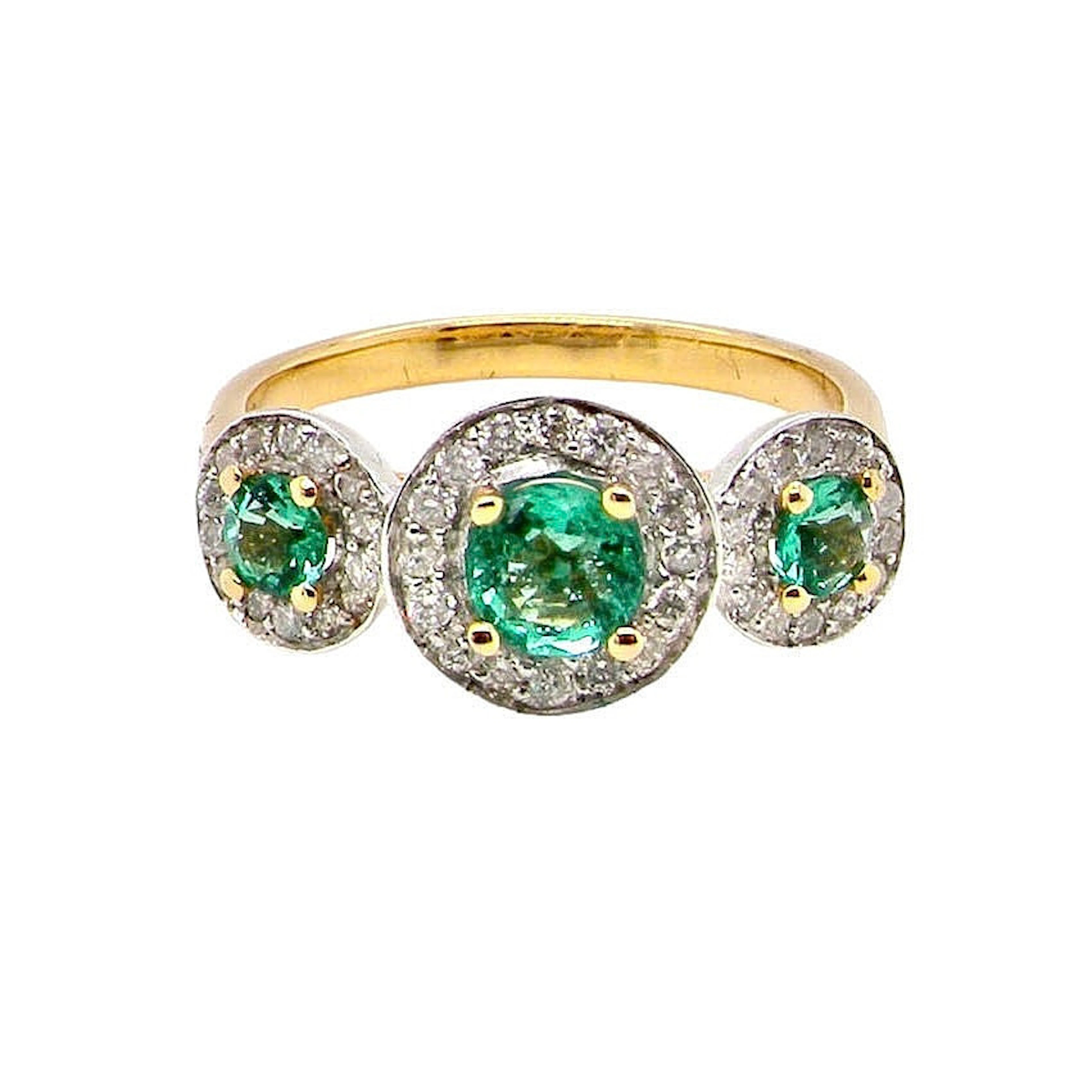 18CT EMERALD & DIAMONDS RING.