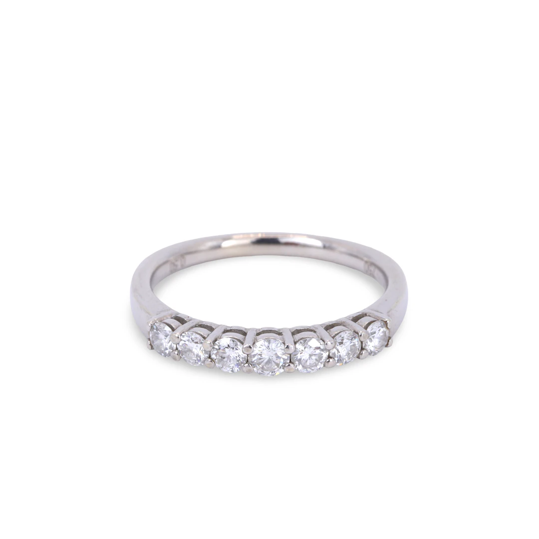 18CT GOLD DIAMOND HALF ETERNITY RING.