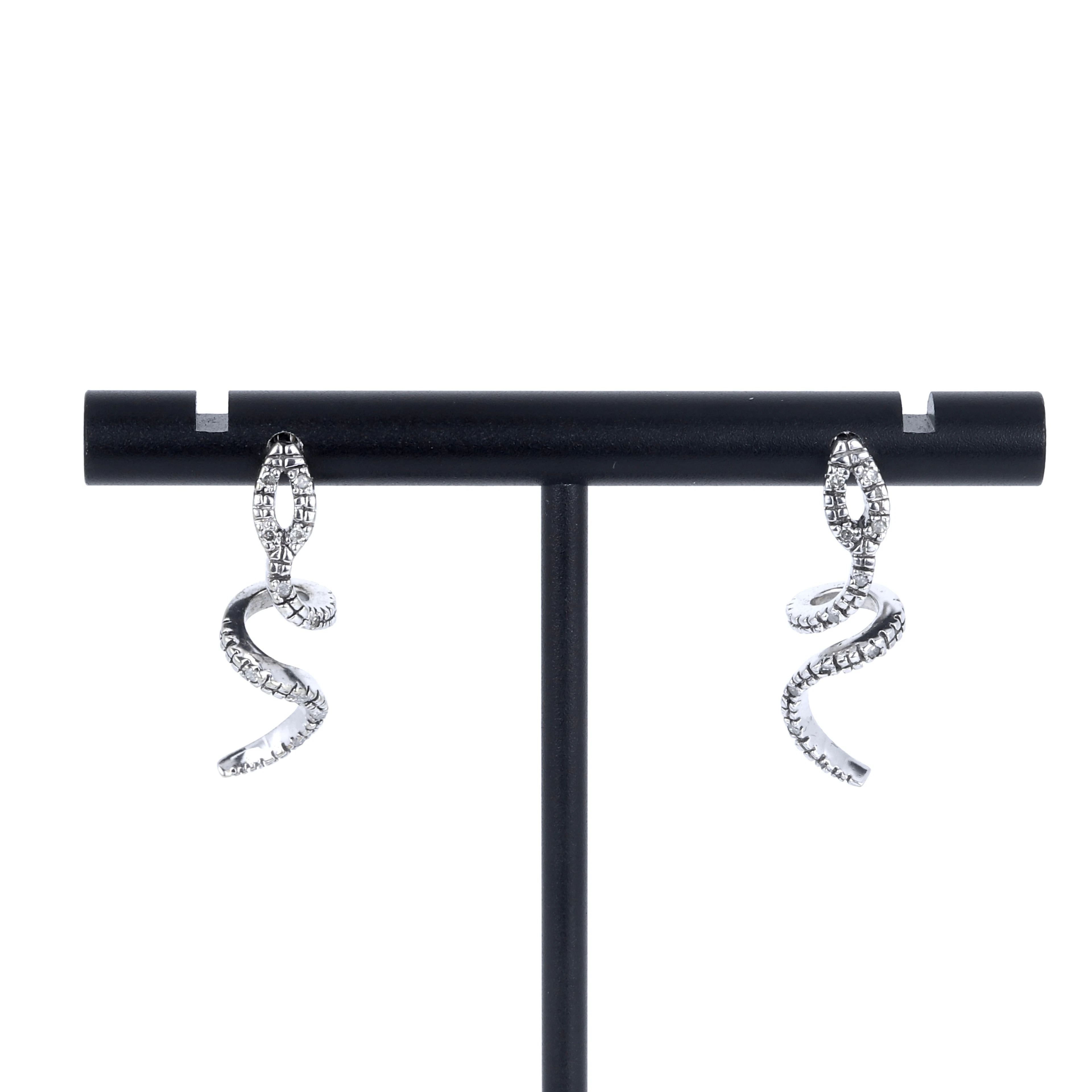 9CT DIAMOND SNAKE EARRINGS.